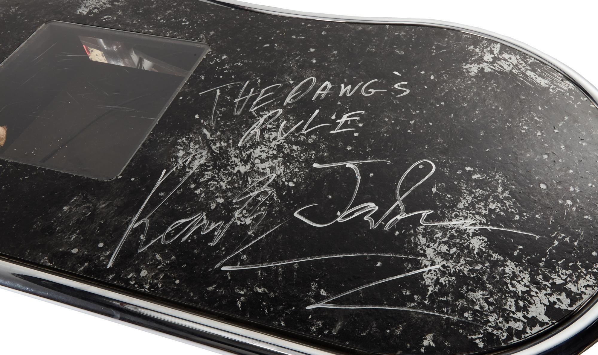 a desk with a signature