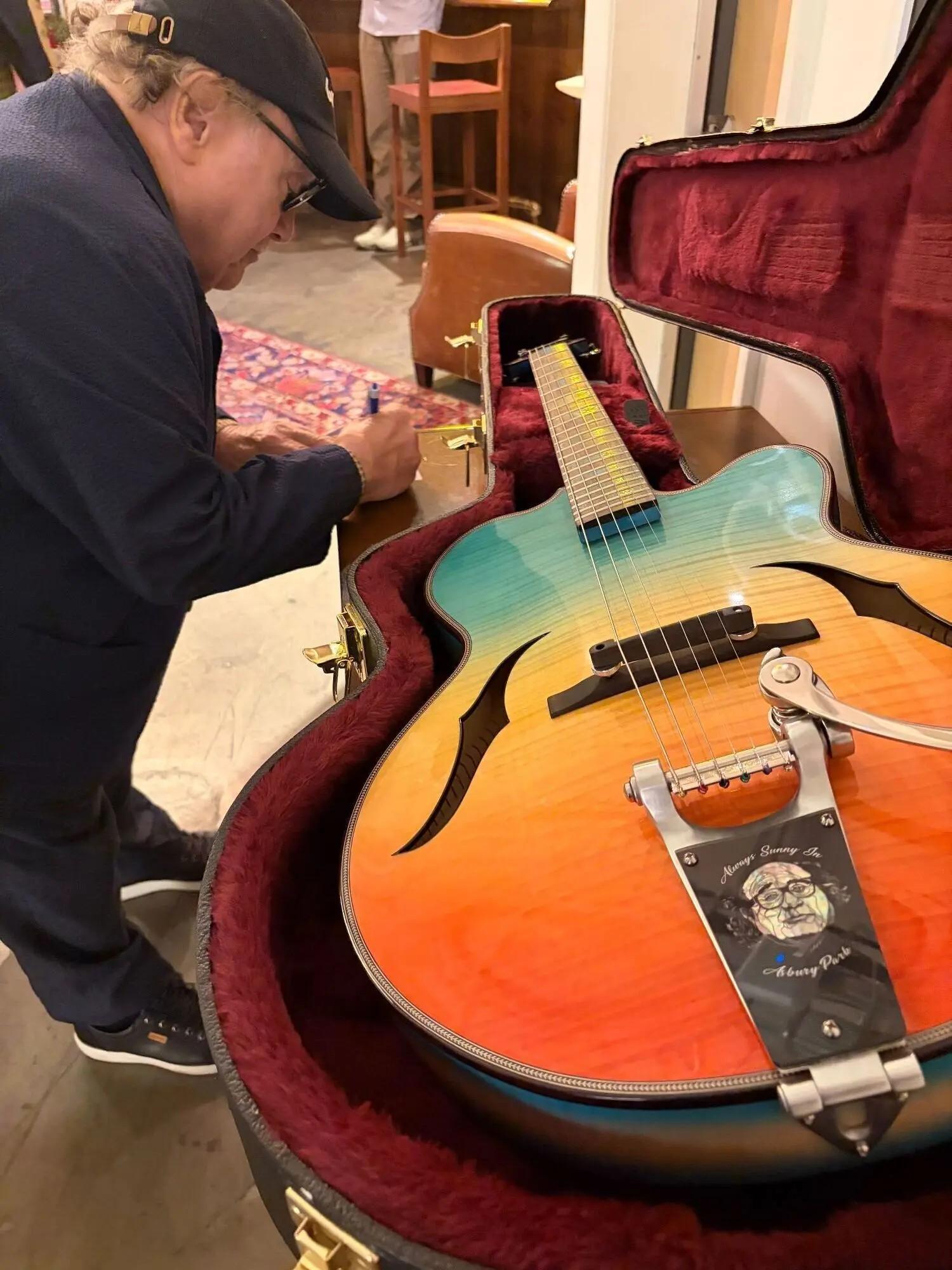 Lot #462 Danny DeVito Signed Dave Petillo Guitar