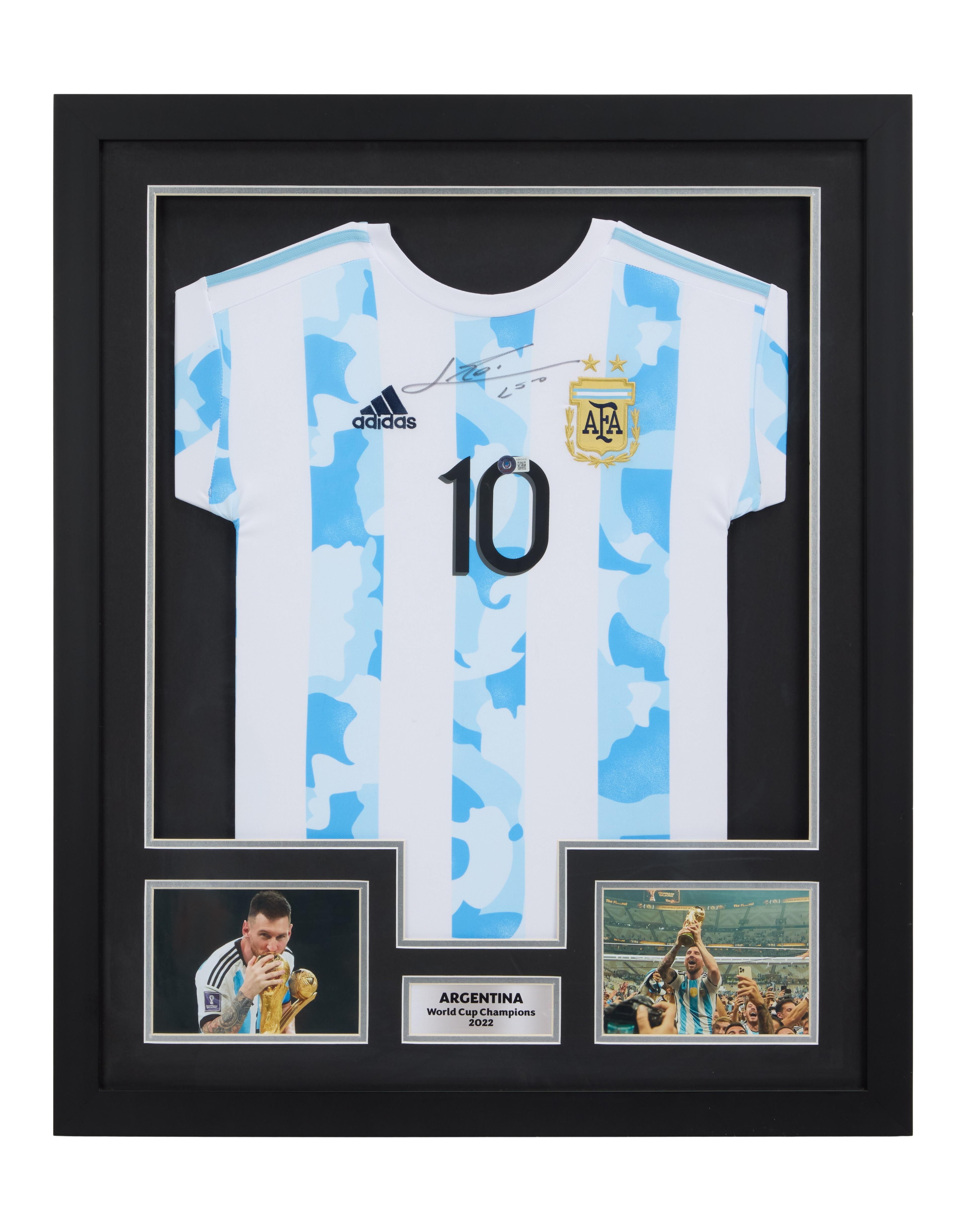 Lionel Messi | Signed 2022 Argentina World Cup Commemorative Jersey Display (Beckett) Lionel Messi | Signed 2022 Argentina World Cup Commemorative Jersey Display (Beckett)