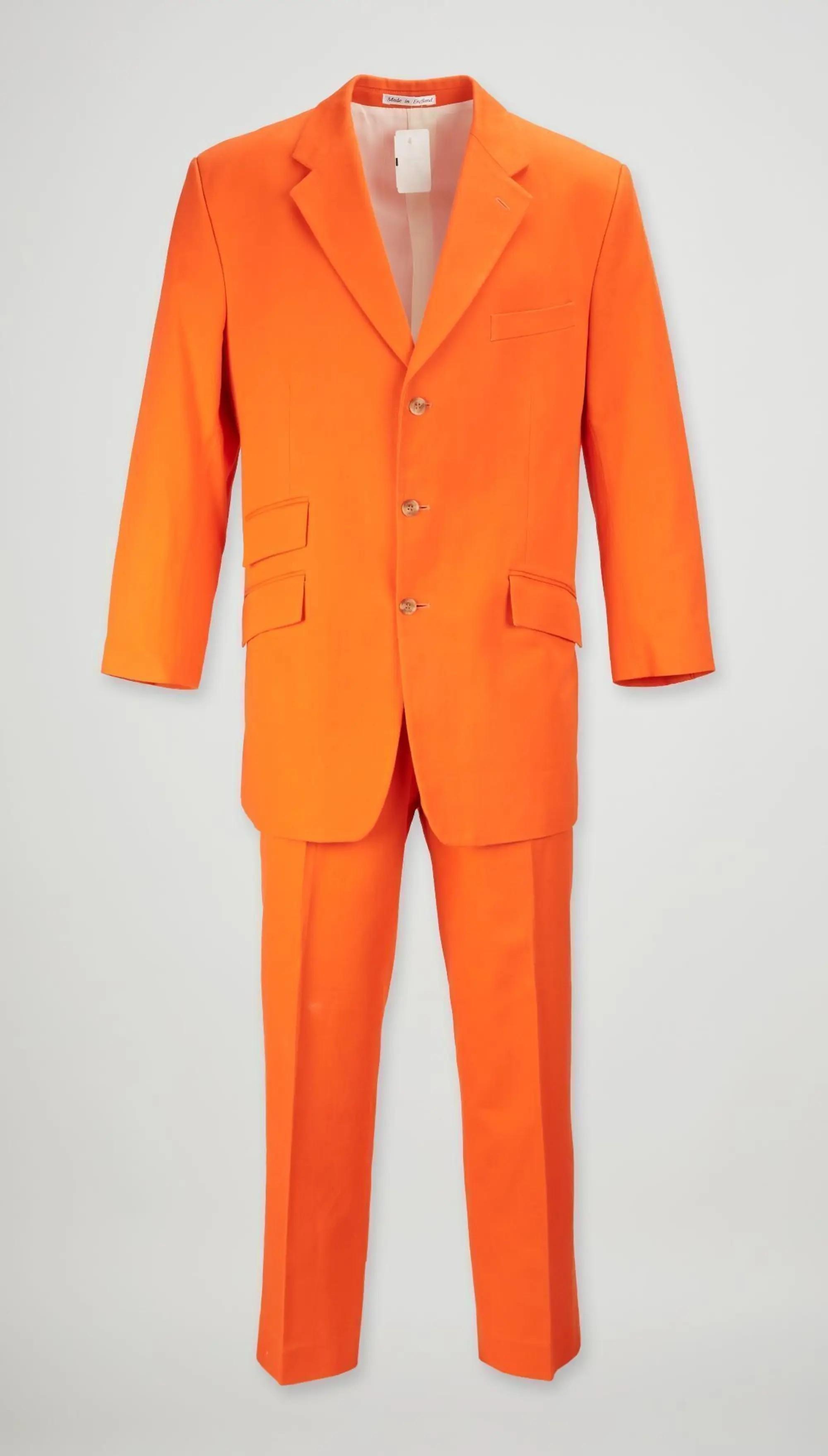 a bright orange dress suit