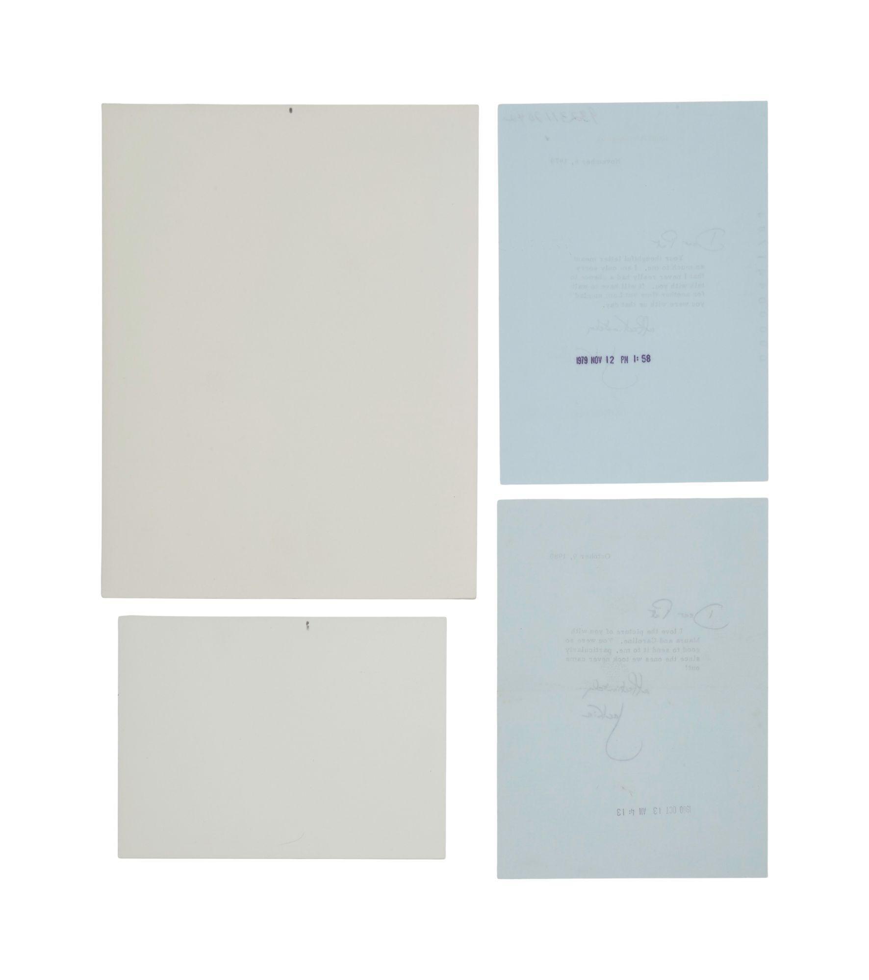a set of four pieces of paper and envelopes on a white background .