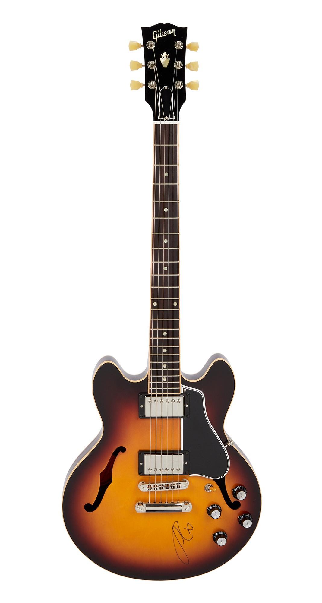 Sabrina Carpenter | Signed Gibson ES-339 Electric Guitar, Sunburst A sunburst Gibson semi-hollow body electric guitar with F-holes and an autograph on the body.