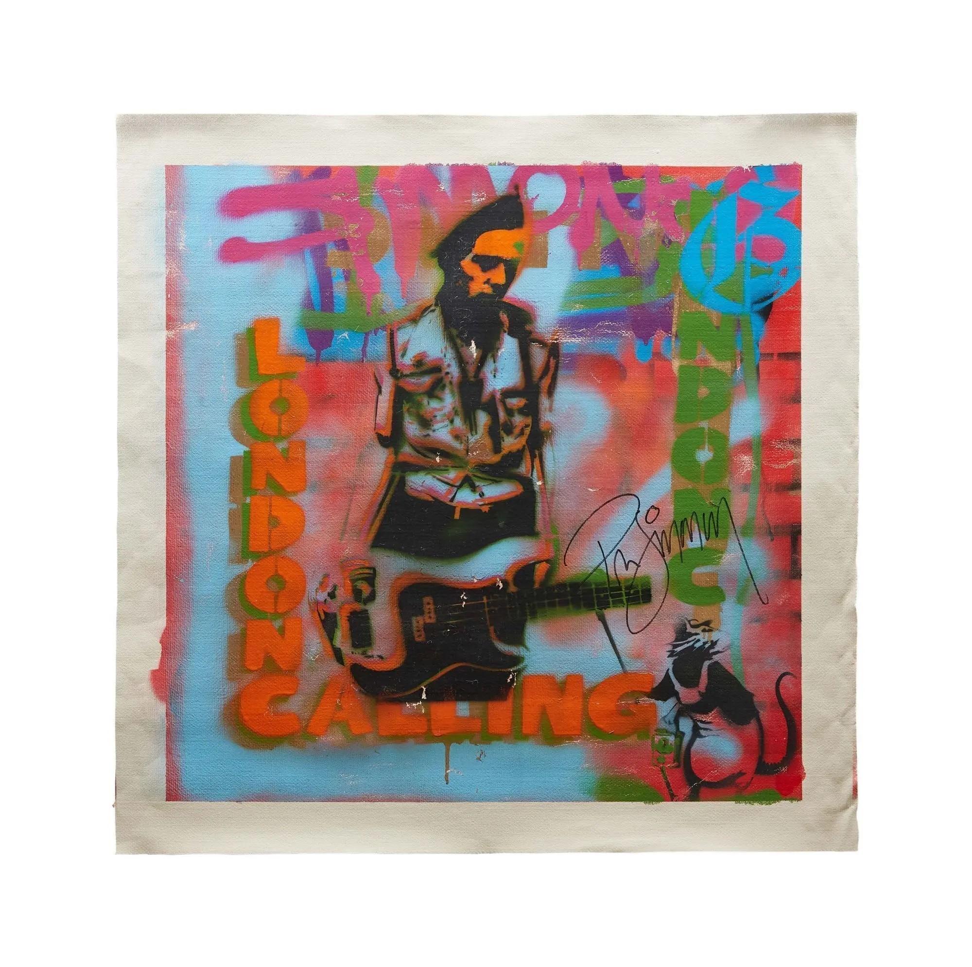 Banksy stencil art on fabric featuring a punk rocker holding a bass guitar, "LONDON CALLING" text, vibrant graffiti background, and a Banksy rat.