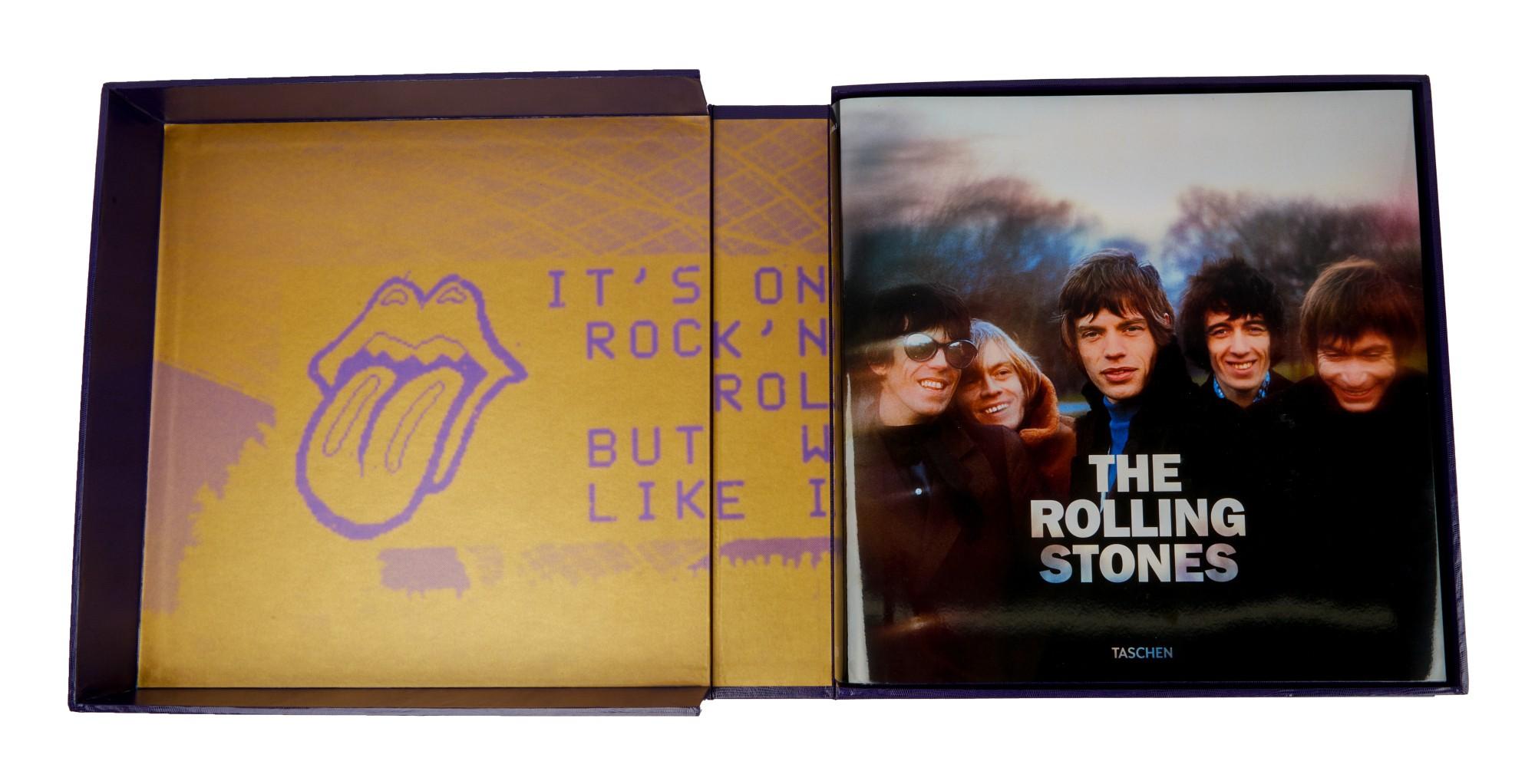a box with a picture of the rolling stones on it .