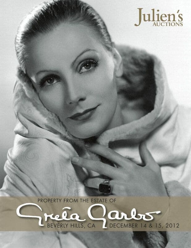 A poster for Julien's Auctions featuring Greta Garbo