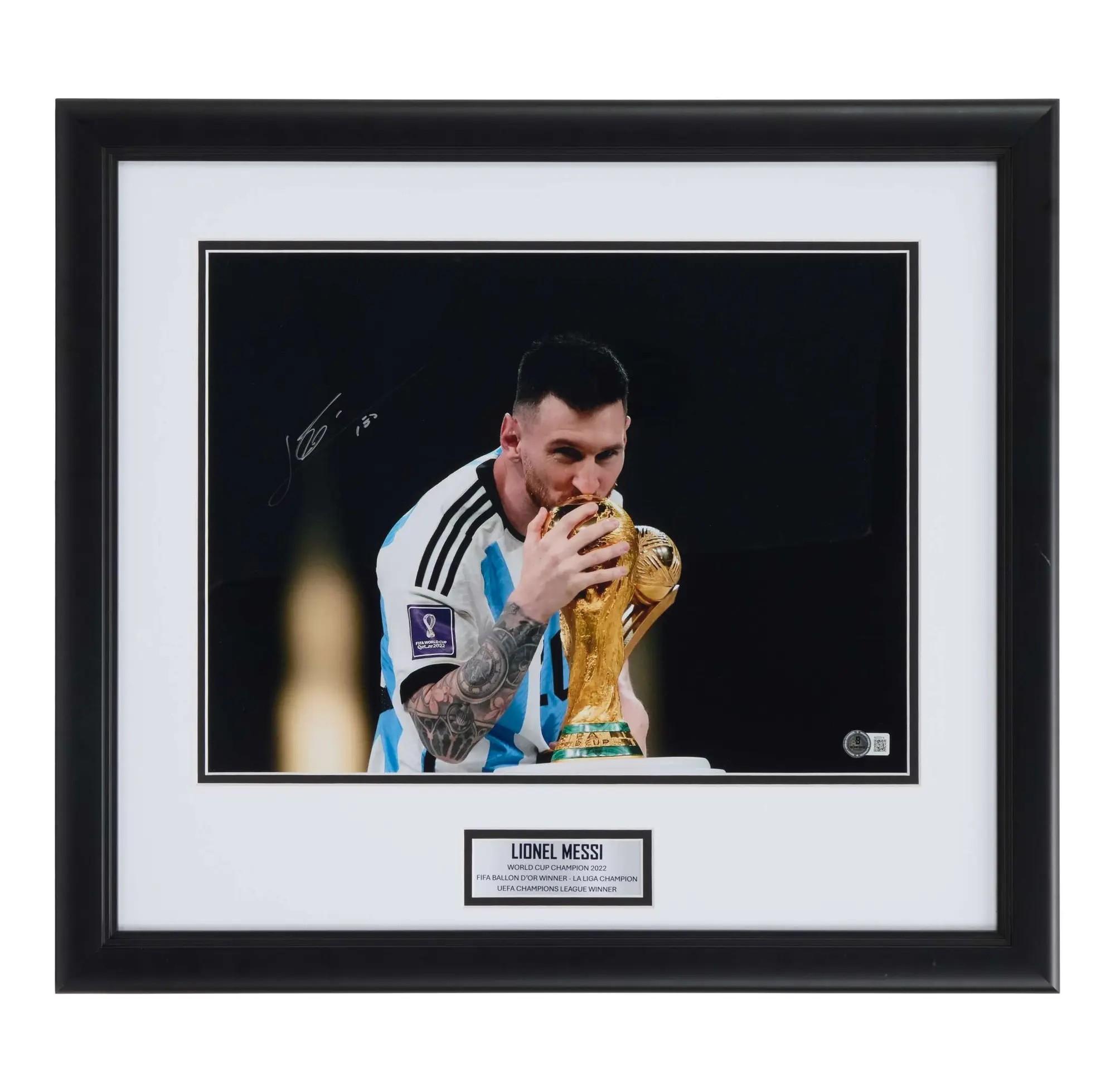 Lot #176  Lionel Messi Signed 2022 Argentina World Cup Trophy Photo (Beckett)
