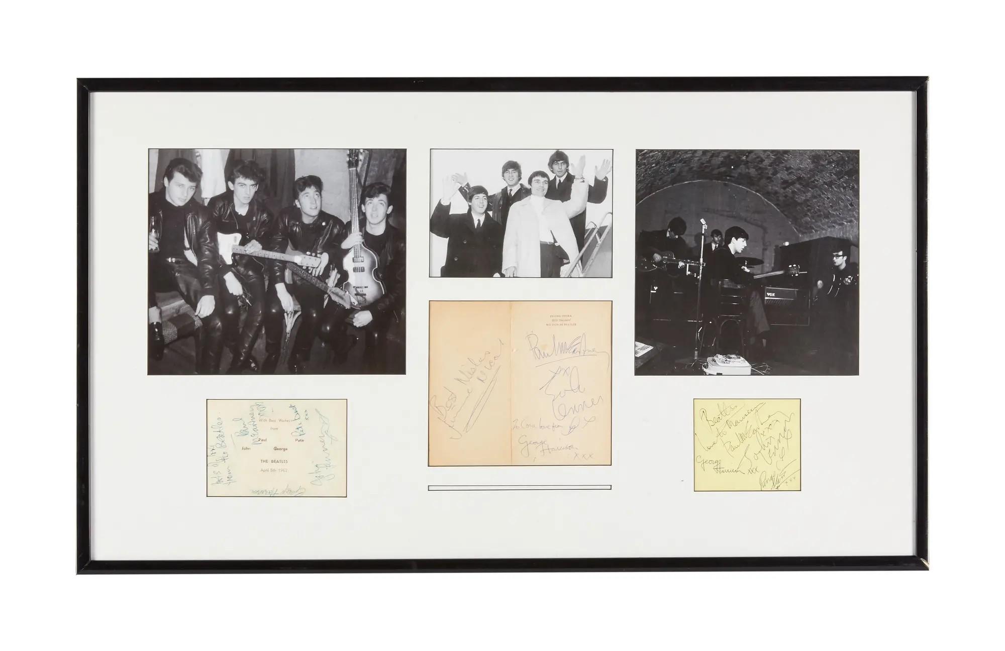 a beatles signed cut sheets display