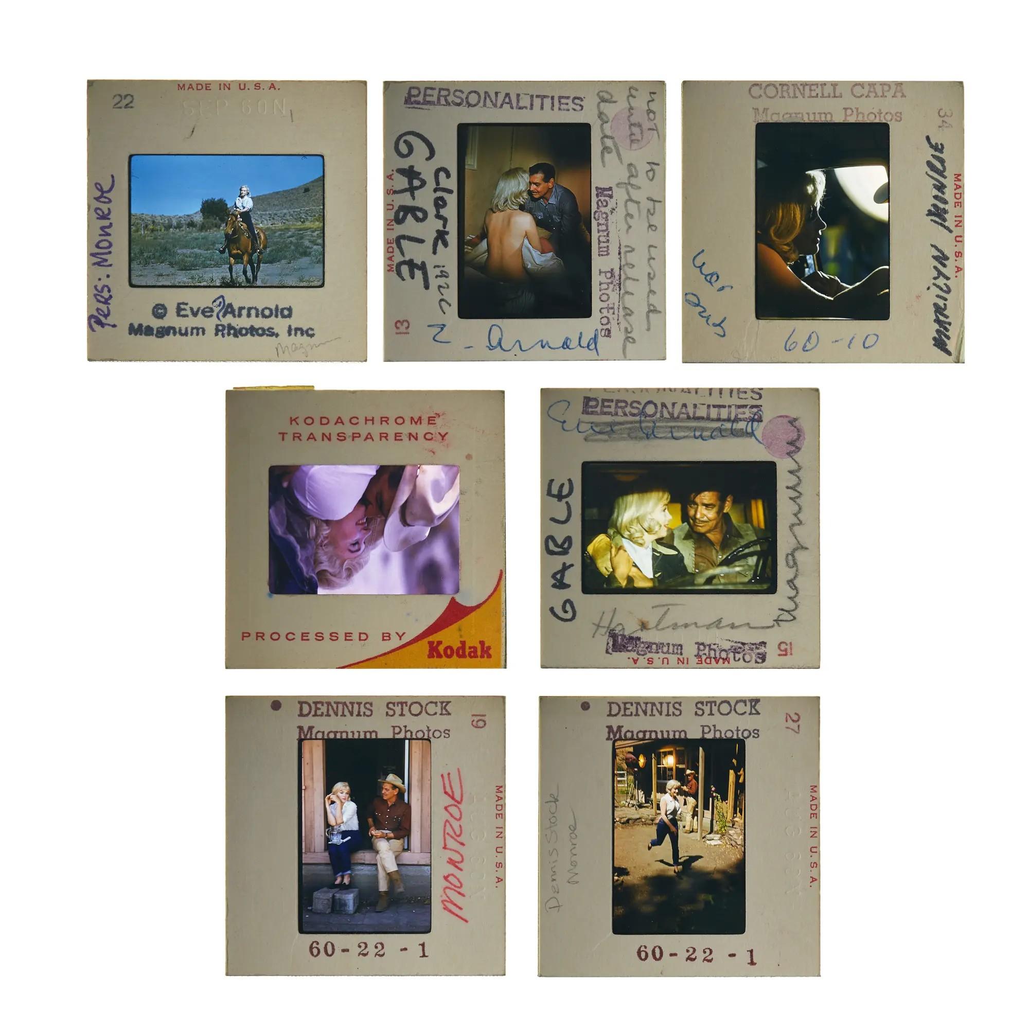 Lot #23. Marilyn Monroe | 1961 Color Slides by Noted Magnum Photographers from "The Misfits" Seven vintage 35mm photographic slides, mostly featuring Marilyn Monroe and Clark Gable, with handwritten labels from Magnum Photos and photographers like Eve Arnold and Dennis Stock.