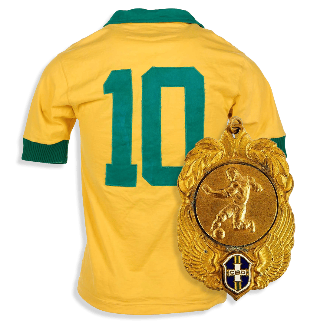 A gold FIFA medal with a female figure hangs beside a blue soccer jersey displaying "MBAPPÉ 7".