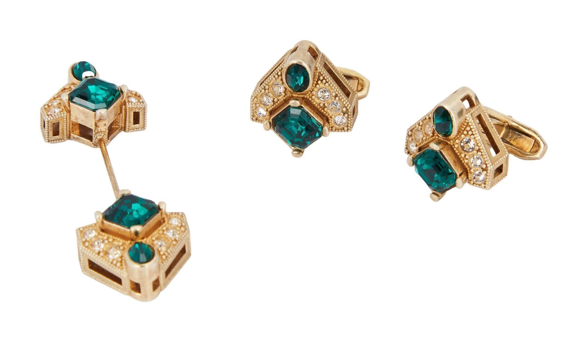 Lot #467. Angus Cloud | 2022 Vanity Fair Oscars Party-Worn Dolce & Gabbana Men's Dress Set a pair of earrings and a pair of cufflinks with emeralds and diamonds on a white background .