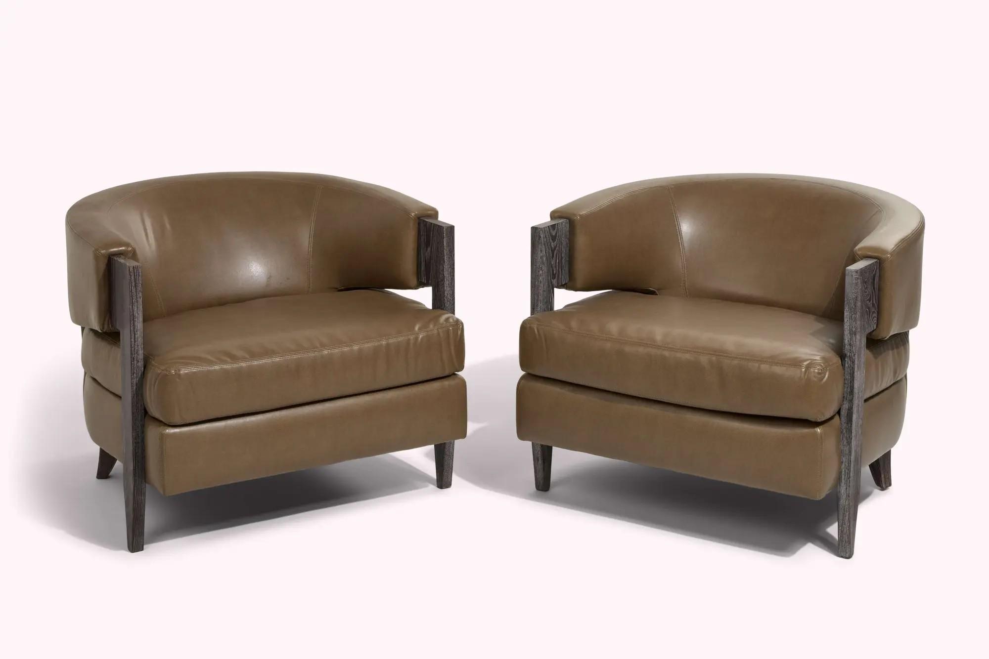 Lot #44. And Just Like That… | Carrie and Big's Pair of Embossed Leather Club Chairs Lot #44 And Just Like That… Carrie and Big's Pair of Embossed Leather Club Chairs