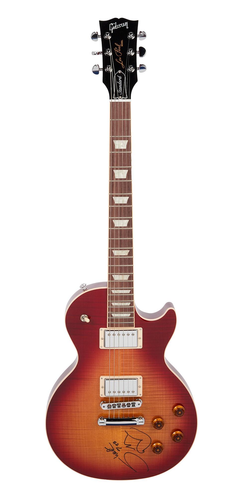 Shakira | Signed Gibson Les Paul Standard Electric Guitar, Sunburst A sunburst Gibson Les Paul Standard electric guitar with an autograph on its body.