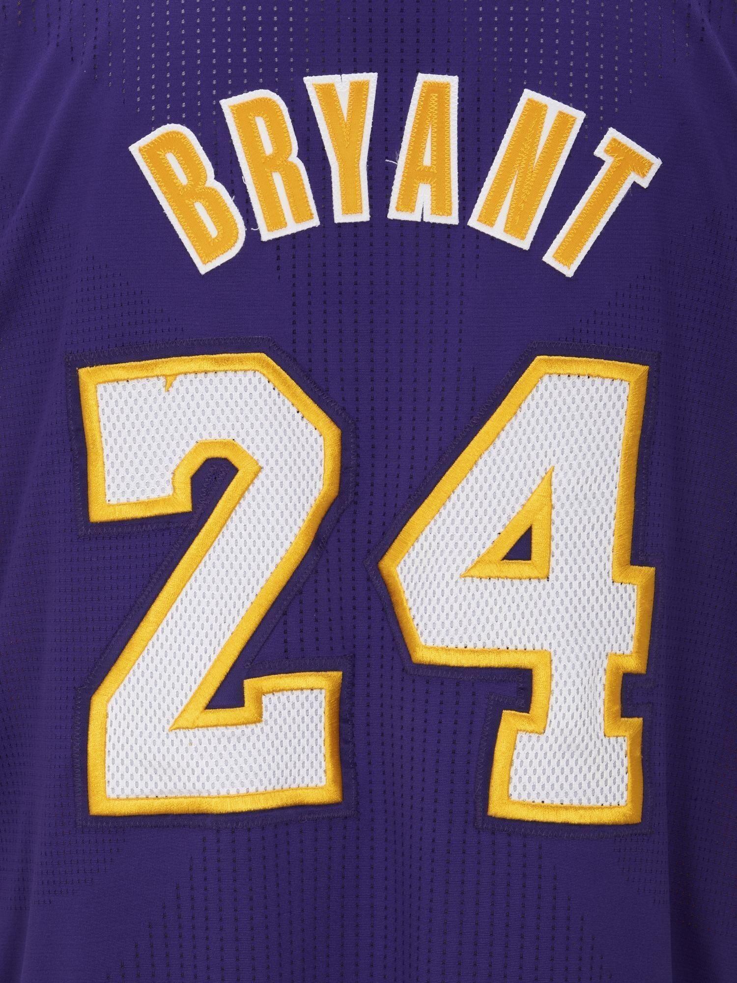 a purple jersey with the number 24 on it