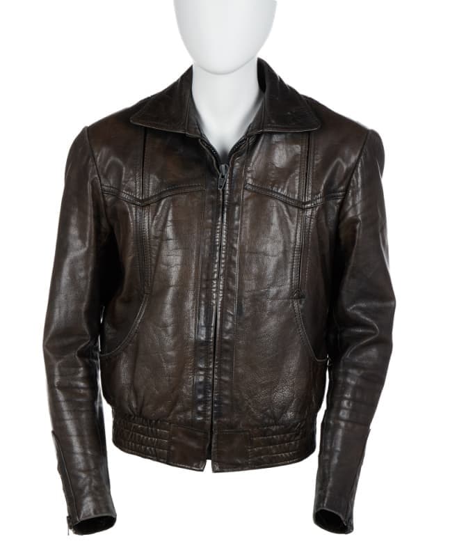 Saturday Night Fever: John Travolta "Anthony 'Tony' Manero" Leather Jacket a brown leather jacket on a mannequin