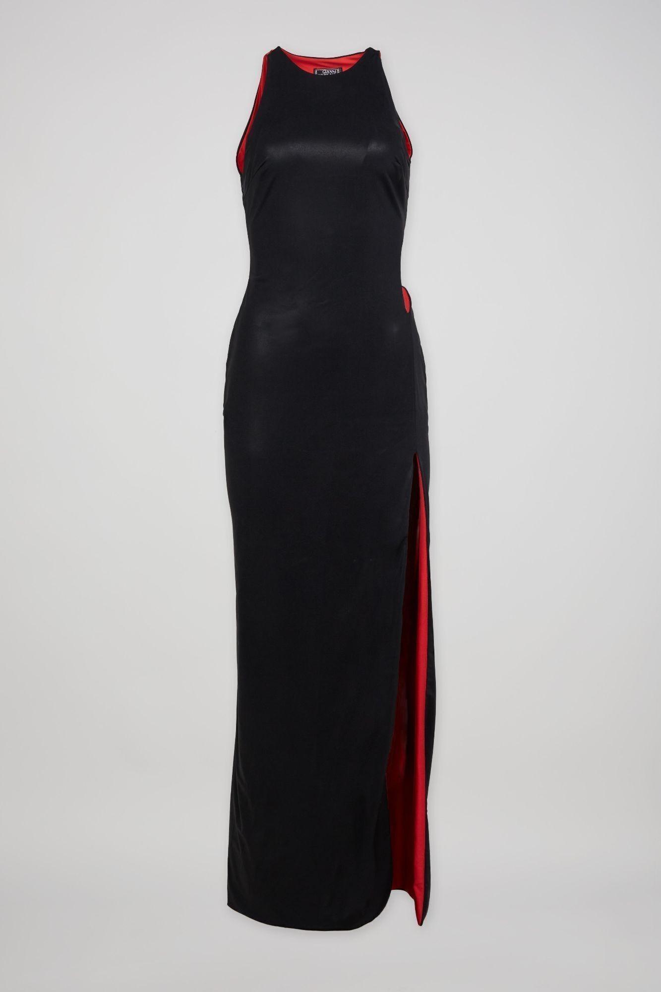 a black dress with a red stripe on the side is on a white background .