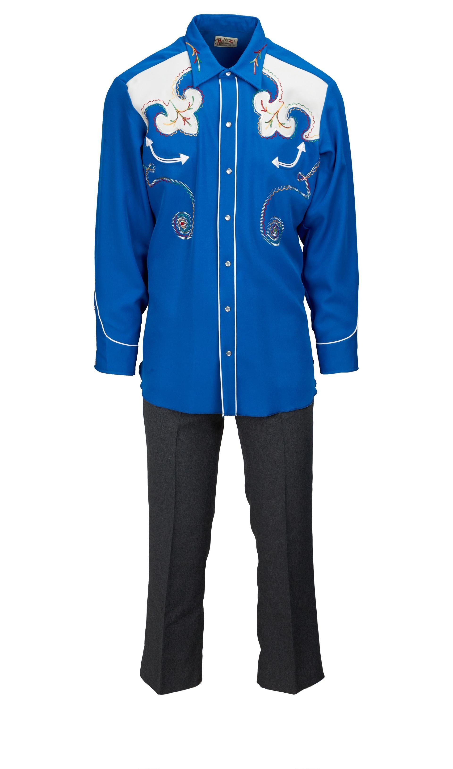 a blue dress shirt and black trousers ensemble