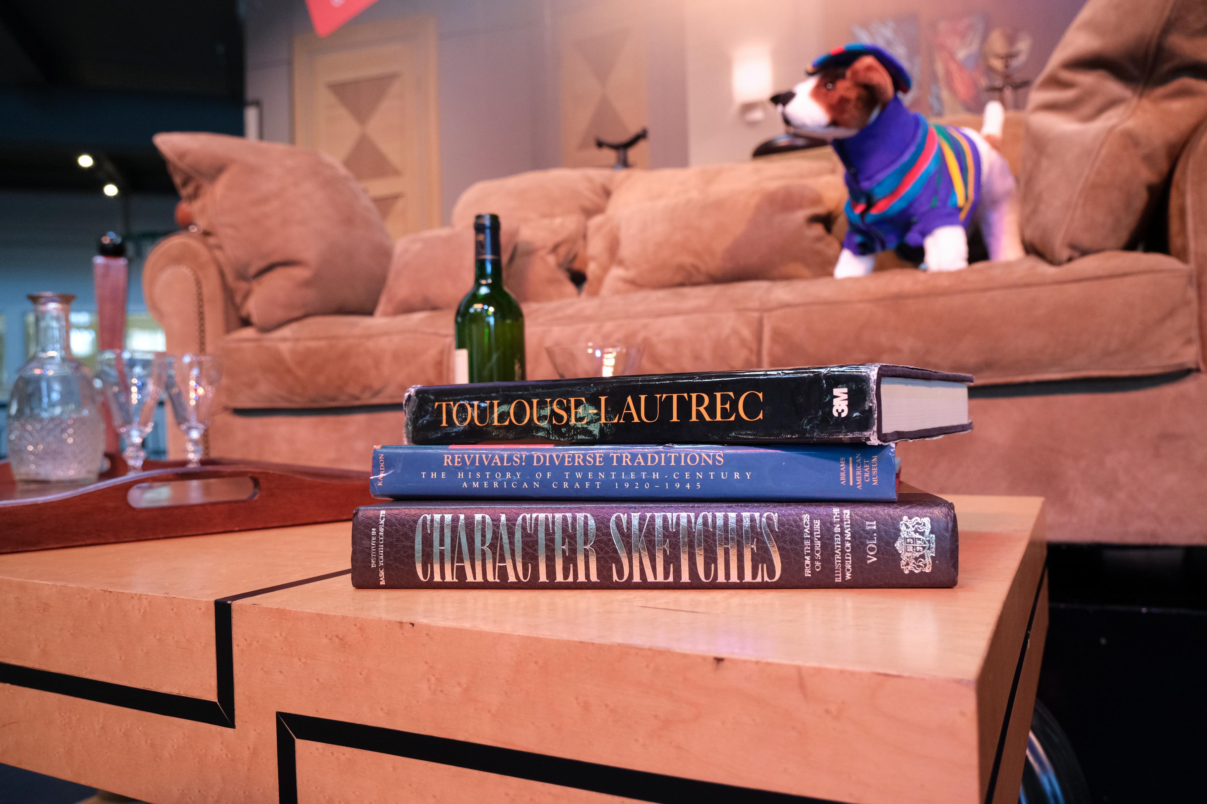 books stacked on a coffee table