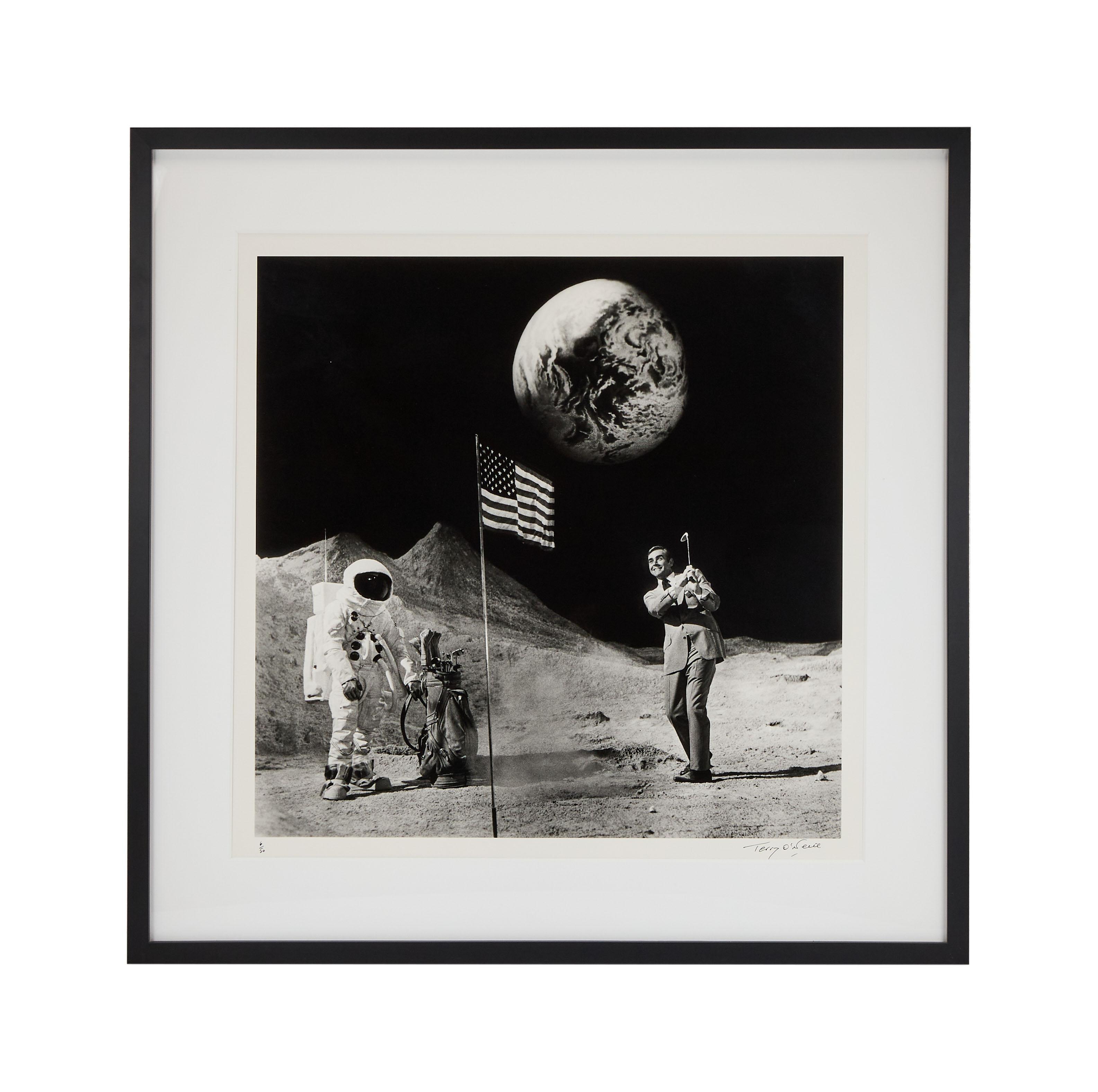 Lot #100. Paul Oakenfold | Sean Connery Photo by Terry O'Neill a black and white photo of a man playing golf on the moon .