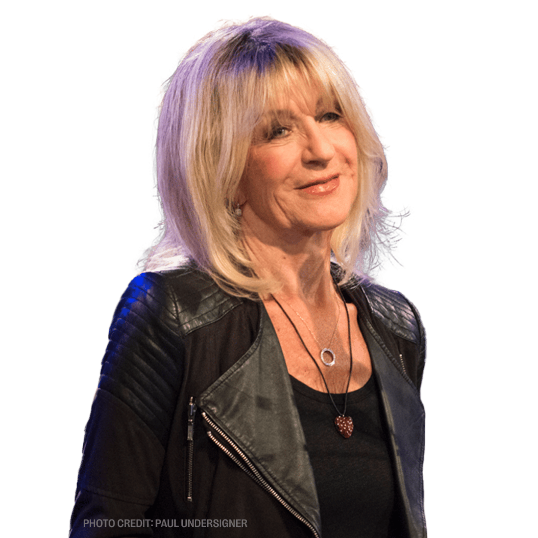 a woman wearing a leather jacket and a necklace with the photo credit paul undersigner