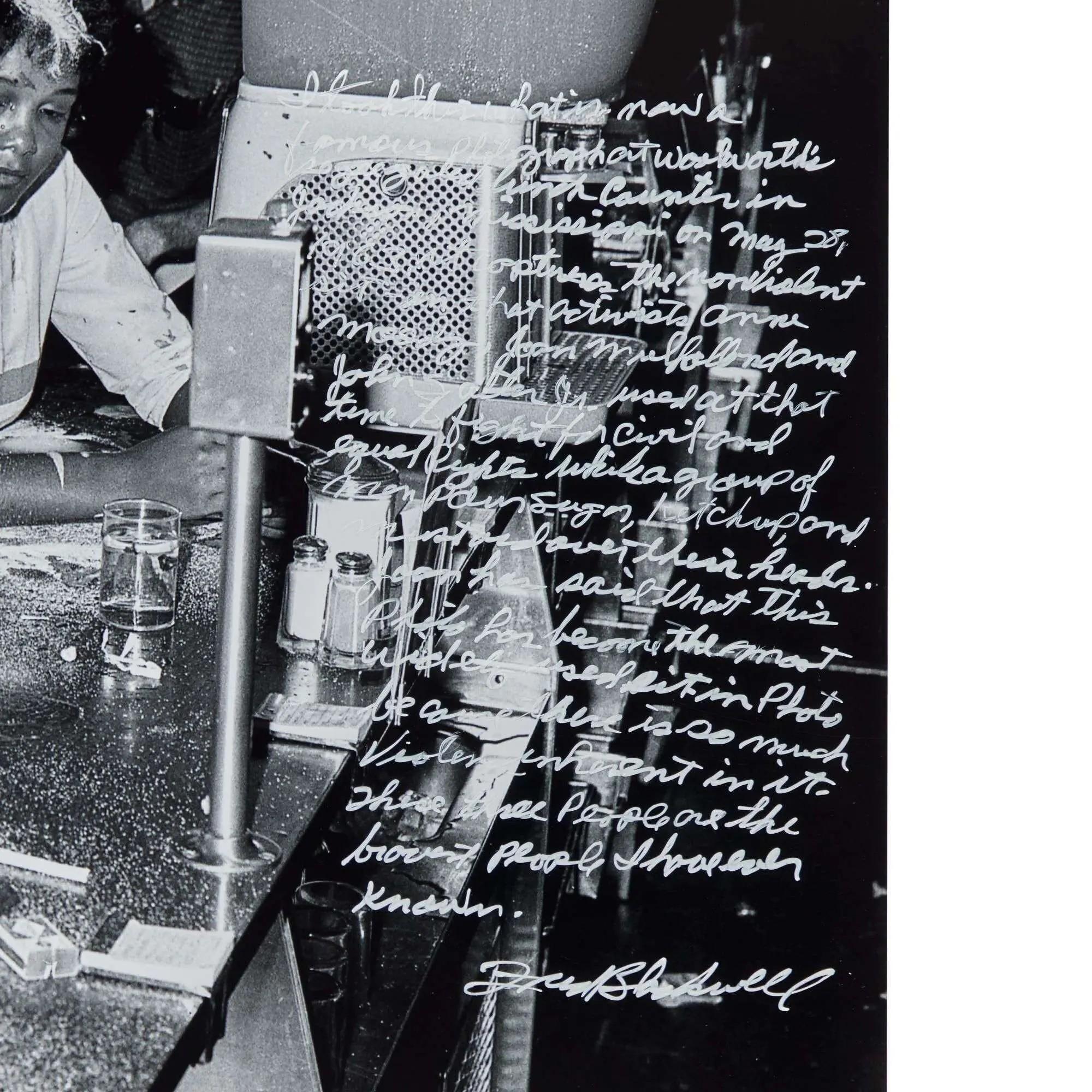 Black and white photo of a young Black person at a diner counter with a glass and shakers. White handwritten text about a Civil Rights sit-in is overlaid on the right, signed Frank Shadwell.