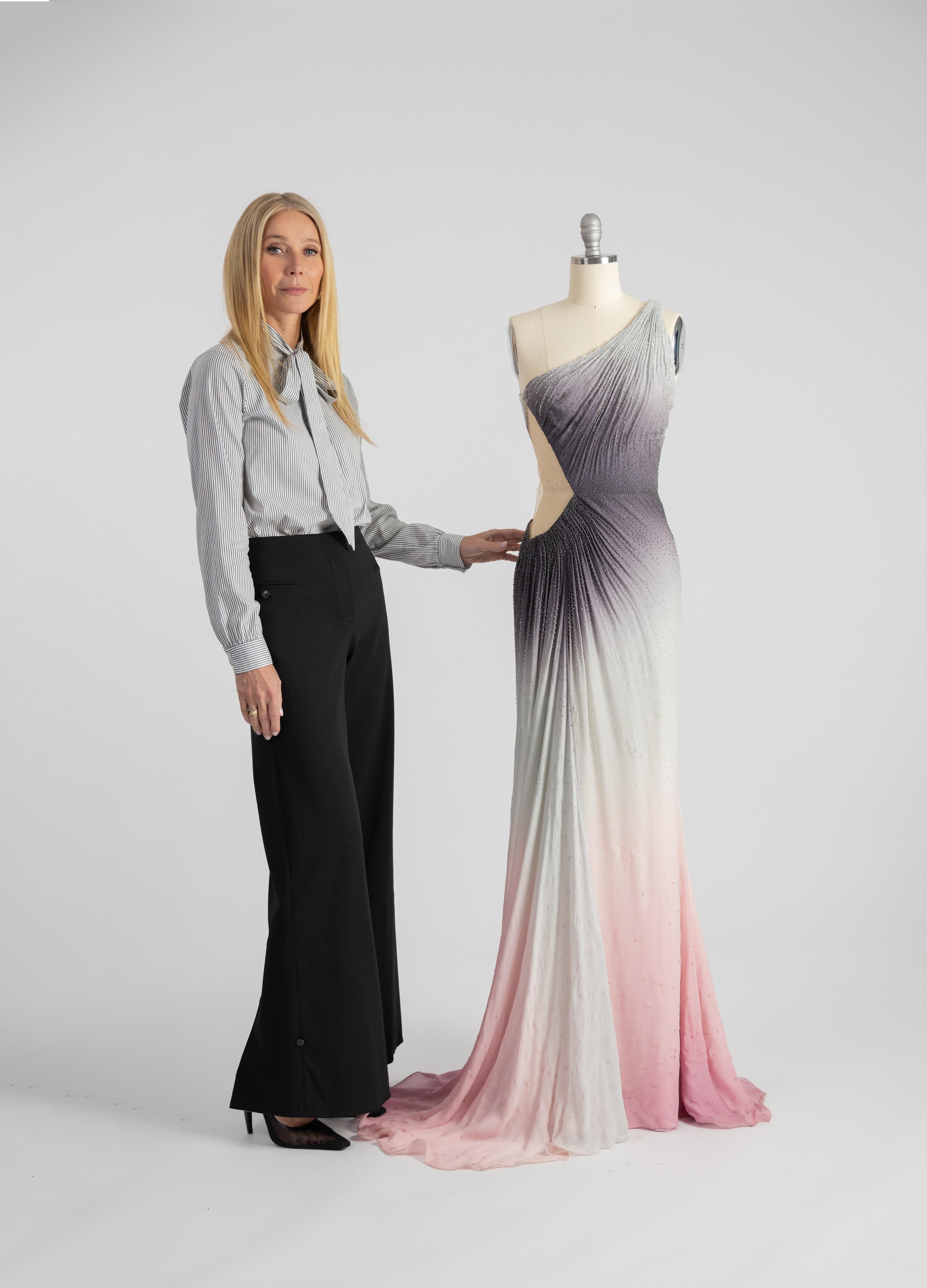 Gwyneth Paltrow Atelier Versace Ombré Evening Gown Gwyneth Paltrow stands next to her Atelier Versace Ombré Evening Gown