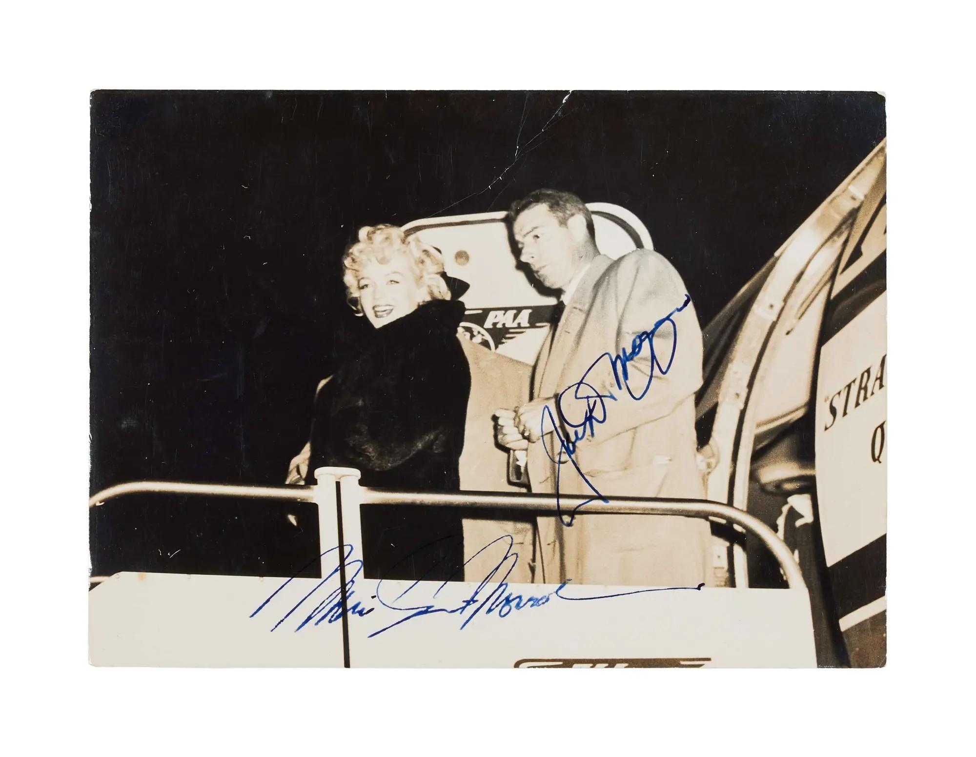 Lot #114. Marilyn Monroe and Joe DiMaggio | 1954 Signed Small Black and White Photograph Lot #114 Marilyn Monroe and Joe DiMaggio 1954 Signed Small Black and White Photograph
