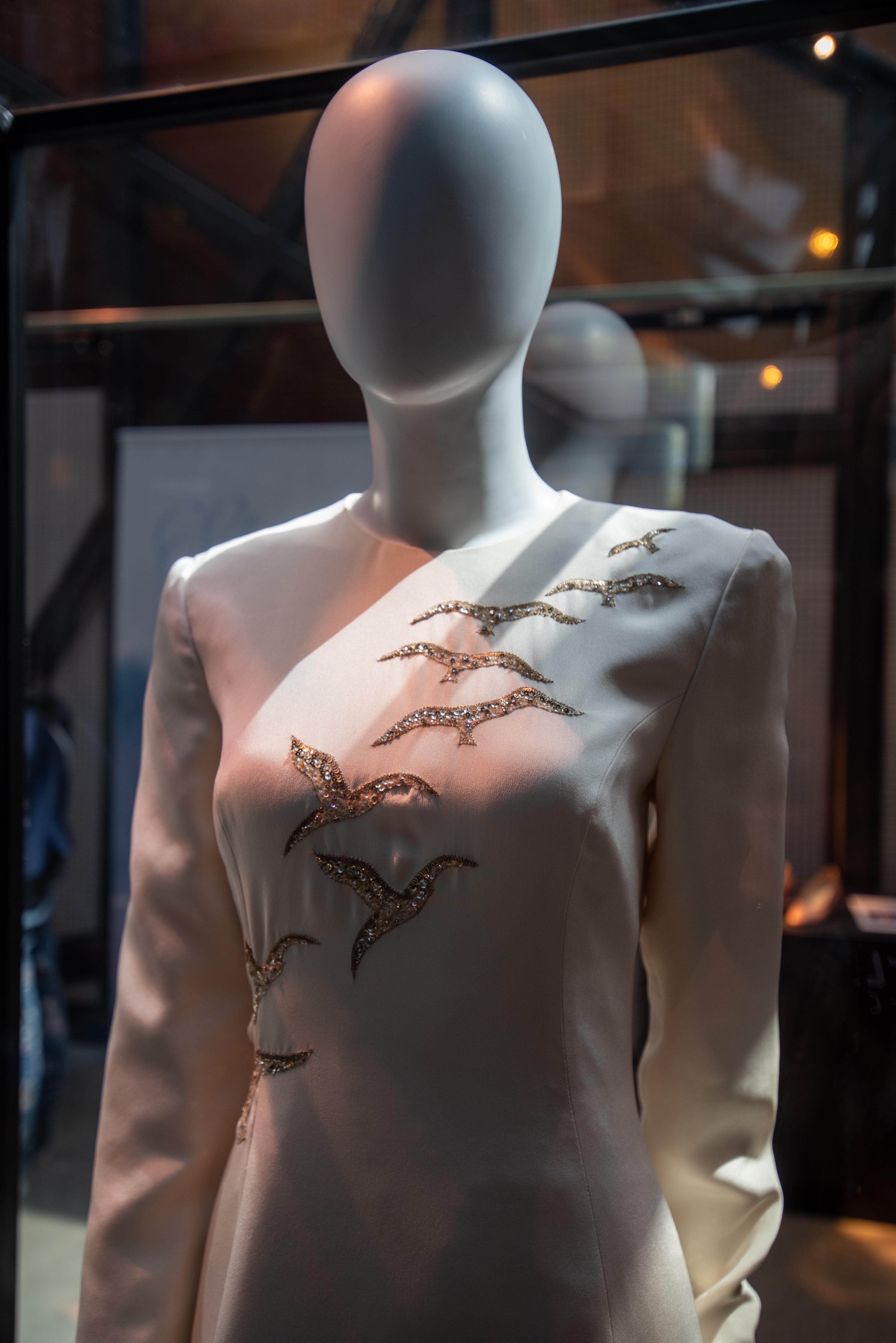 a white dress on a mannequin