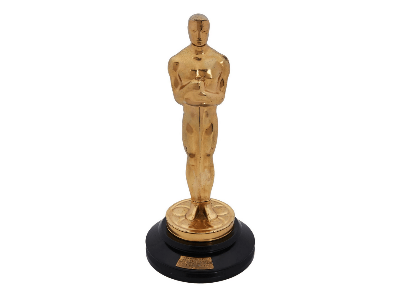 a gold tone oscars statuette