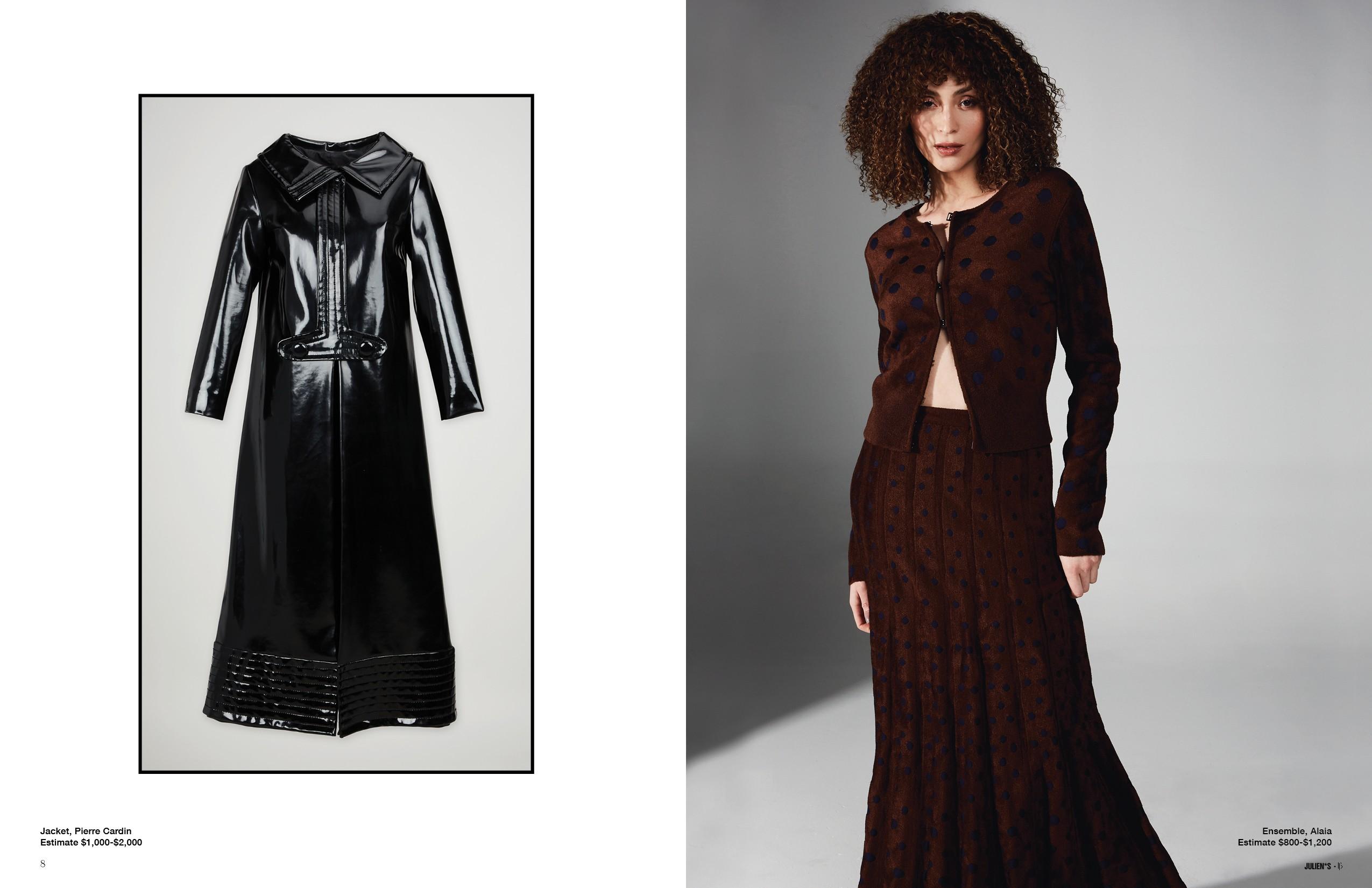 a woman is wearing a black coat and a brown dress .