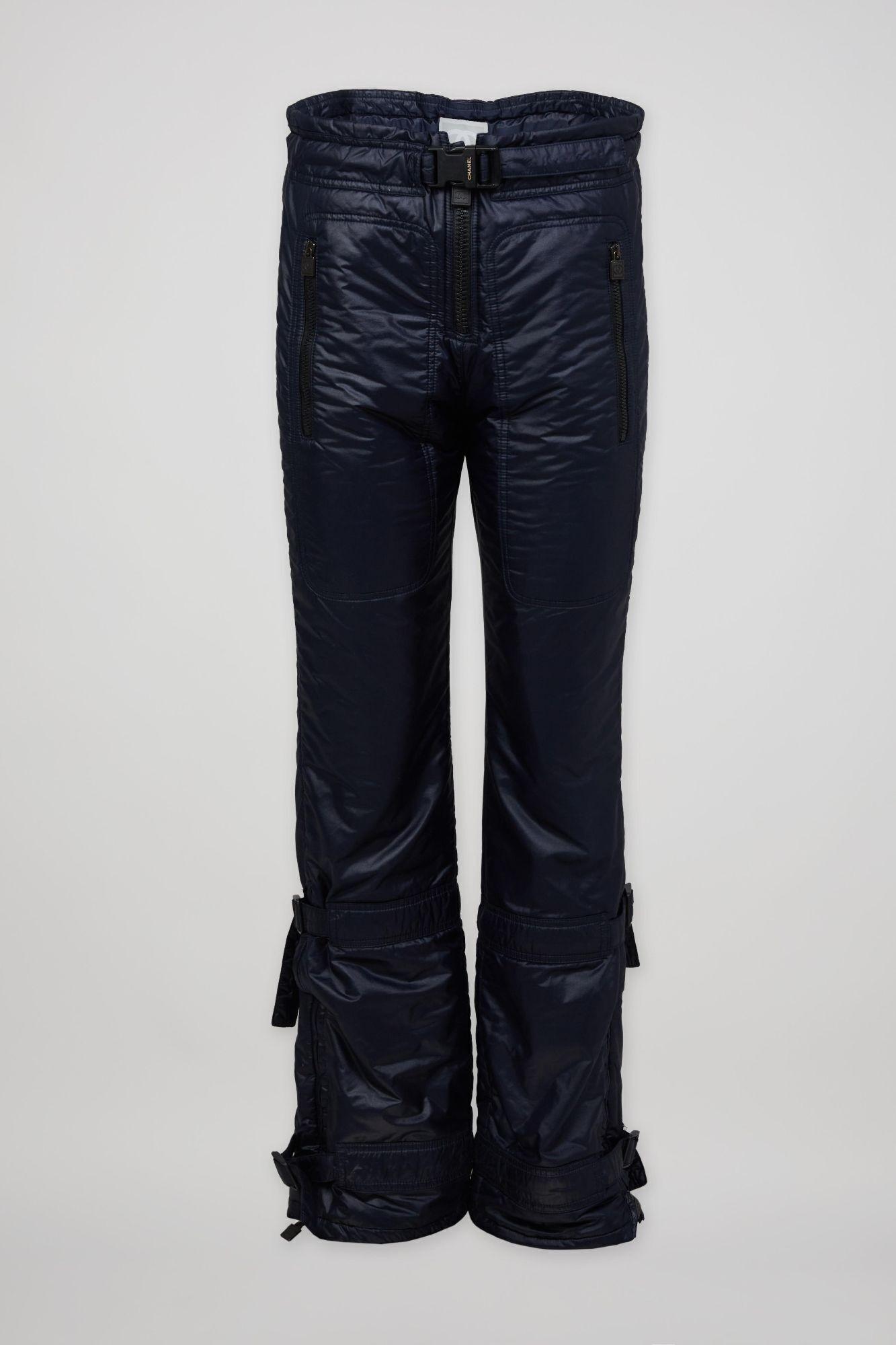 a pair of blue ski pants with a black belt