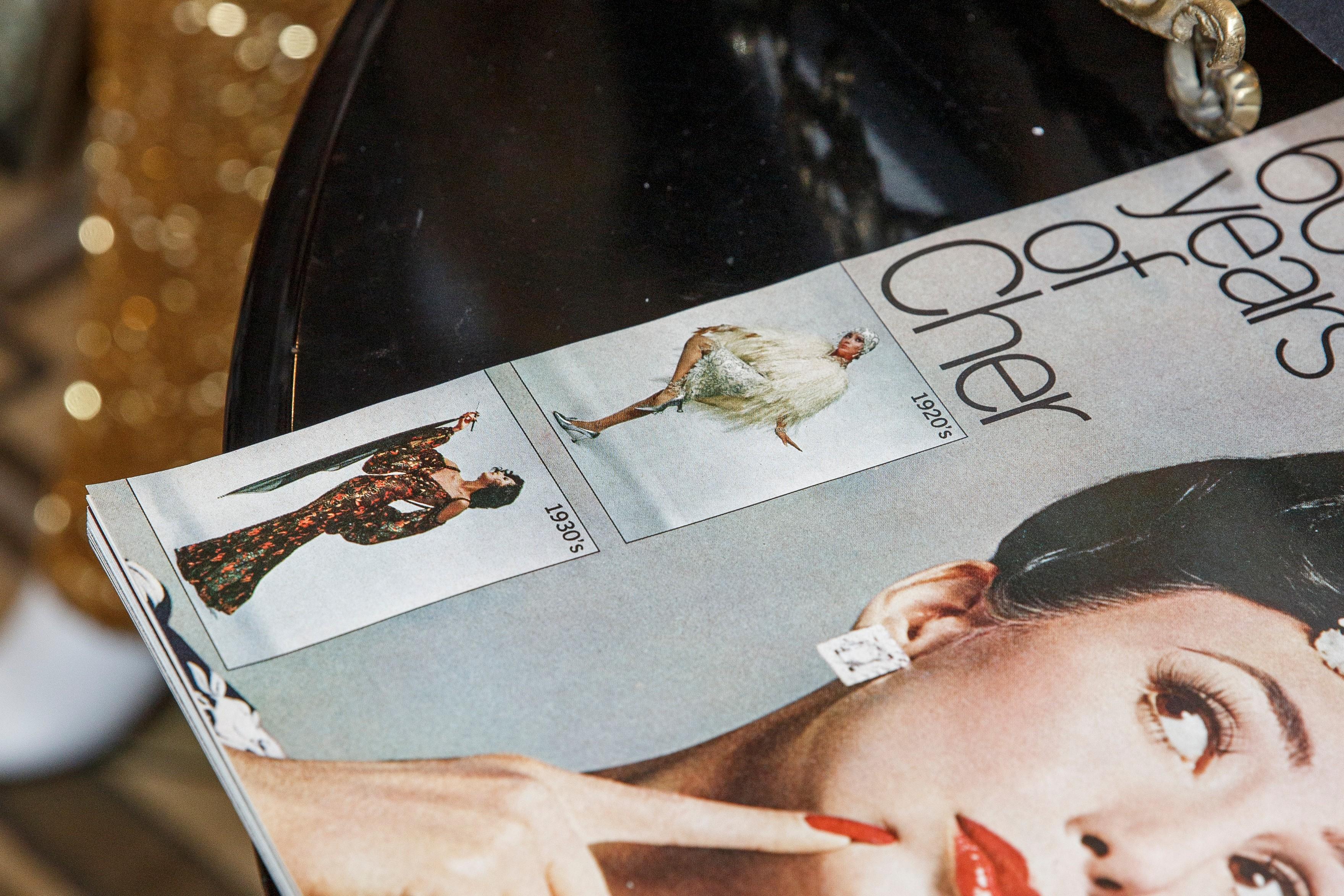 a close up of a magazine with a woman on the cover .