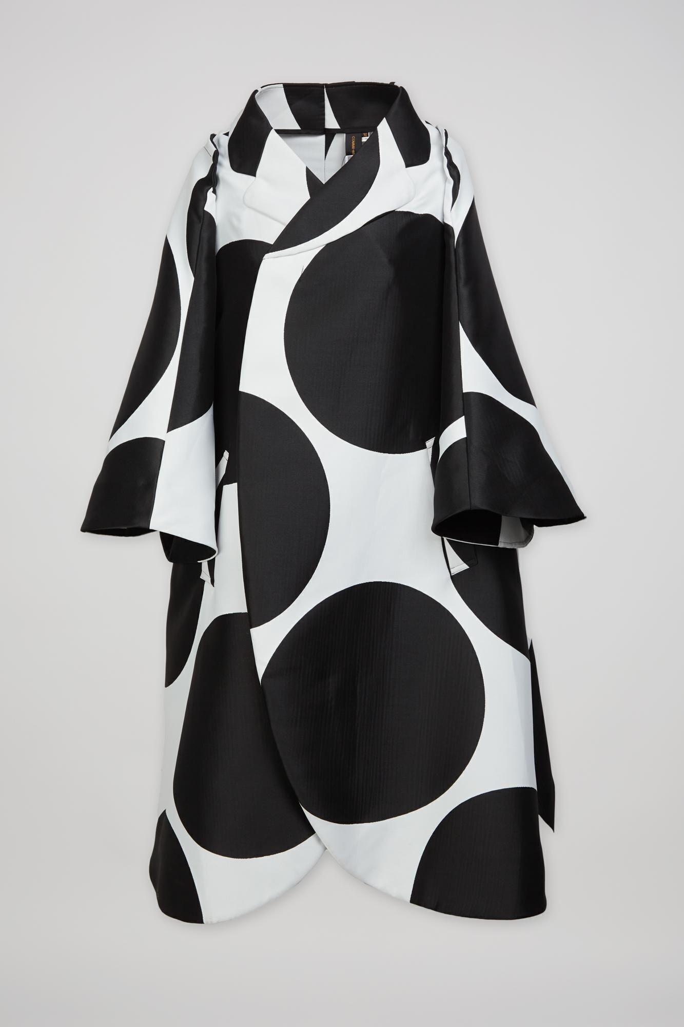 a black and white dress with polka dots on it