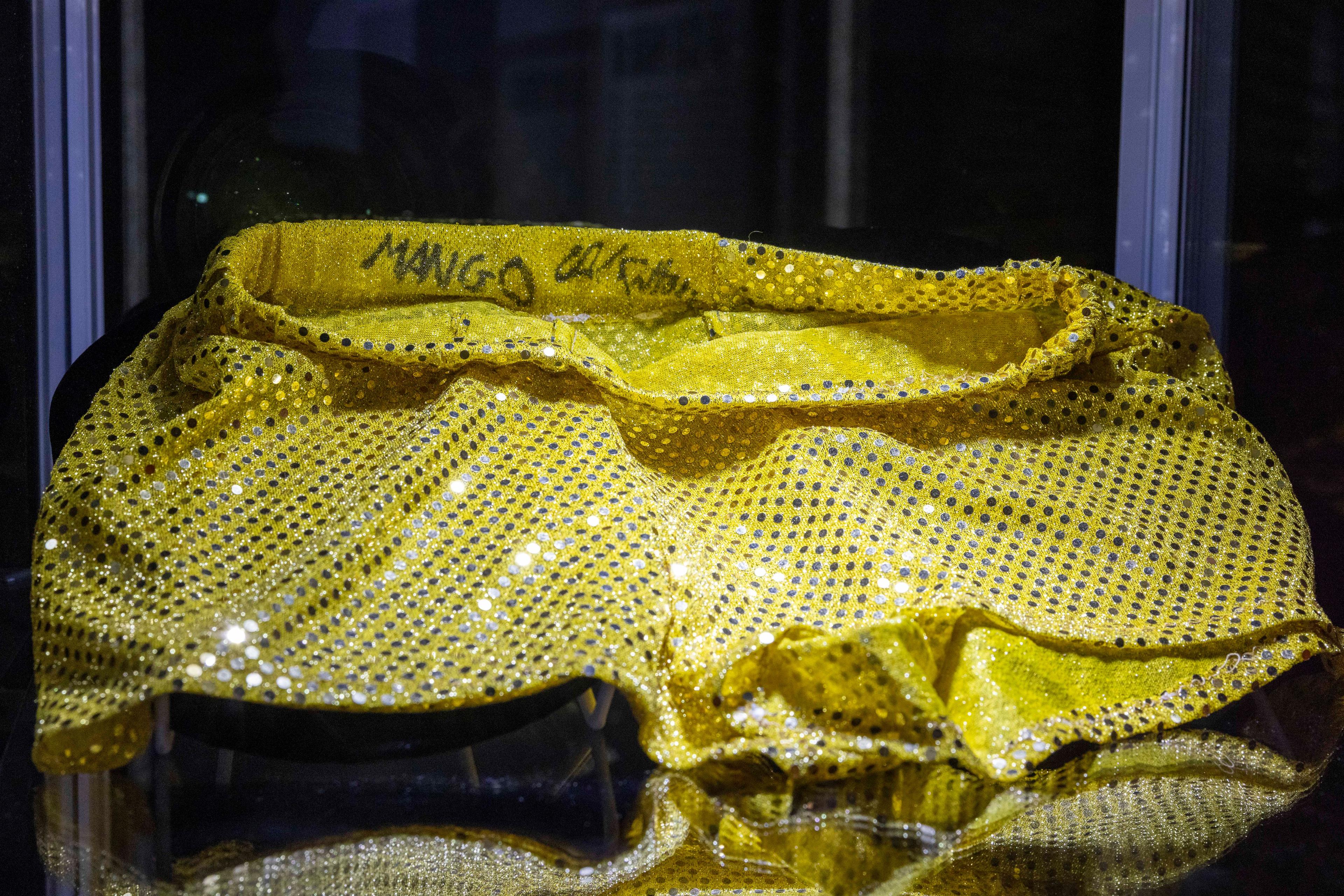 yellow shorts with silver tone sparkles