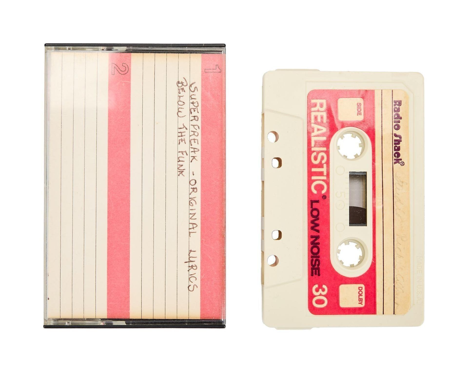 a cassette tape next to a case