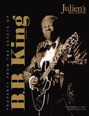 A poster for Julien's Auctions shows B.B. King playing a guitar