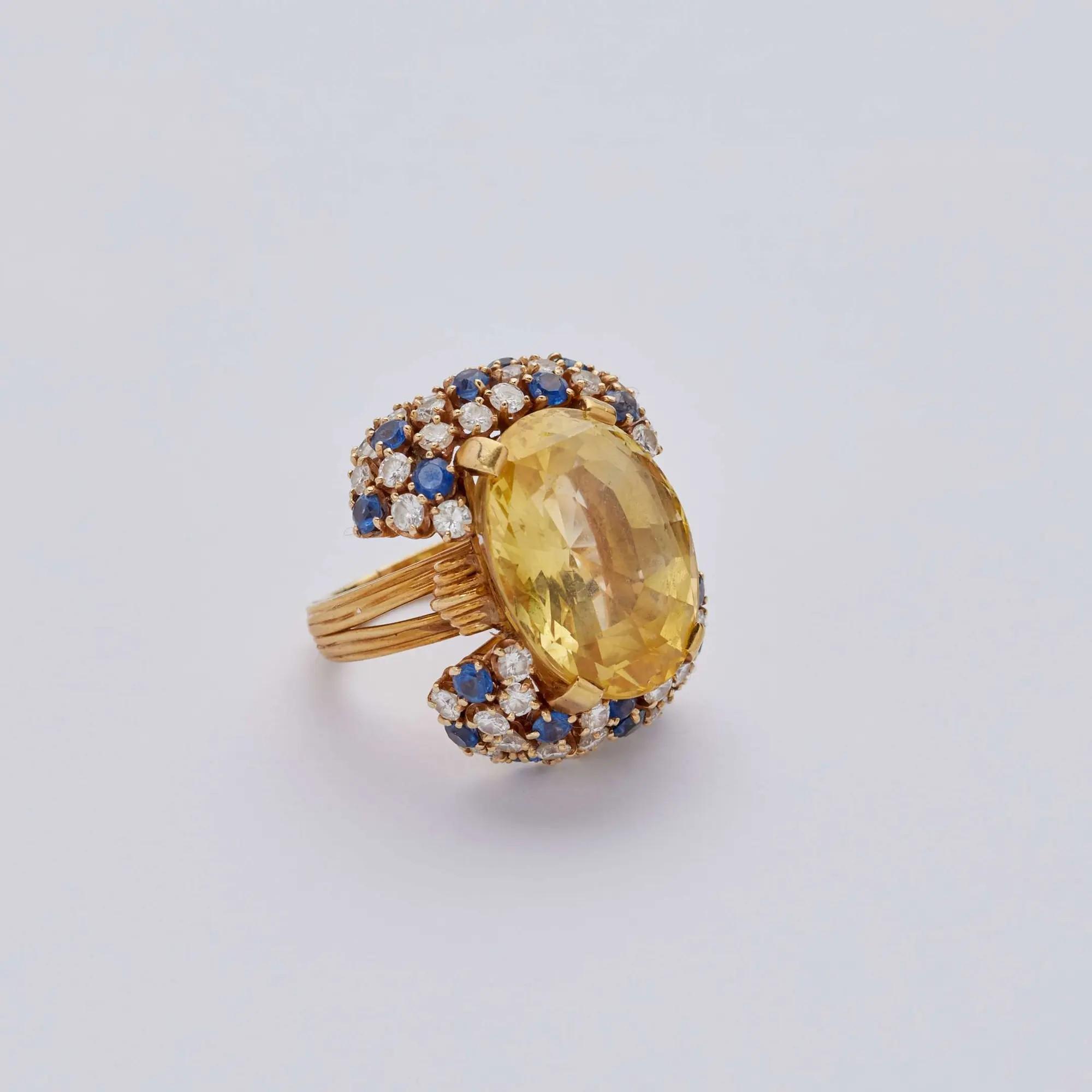 Lot #322  Jerry Weintraub 14K Gold, Yellow Sapphire, Diamond, and Sapphire Ring