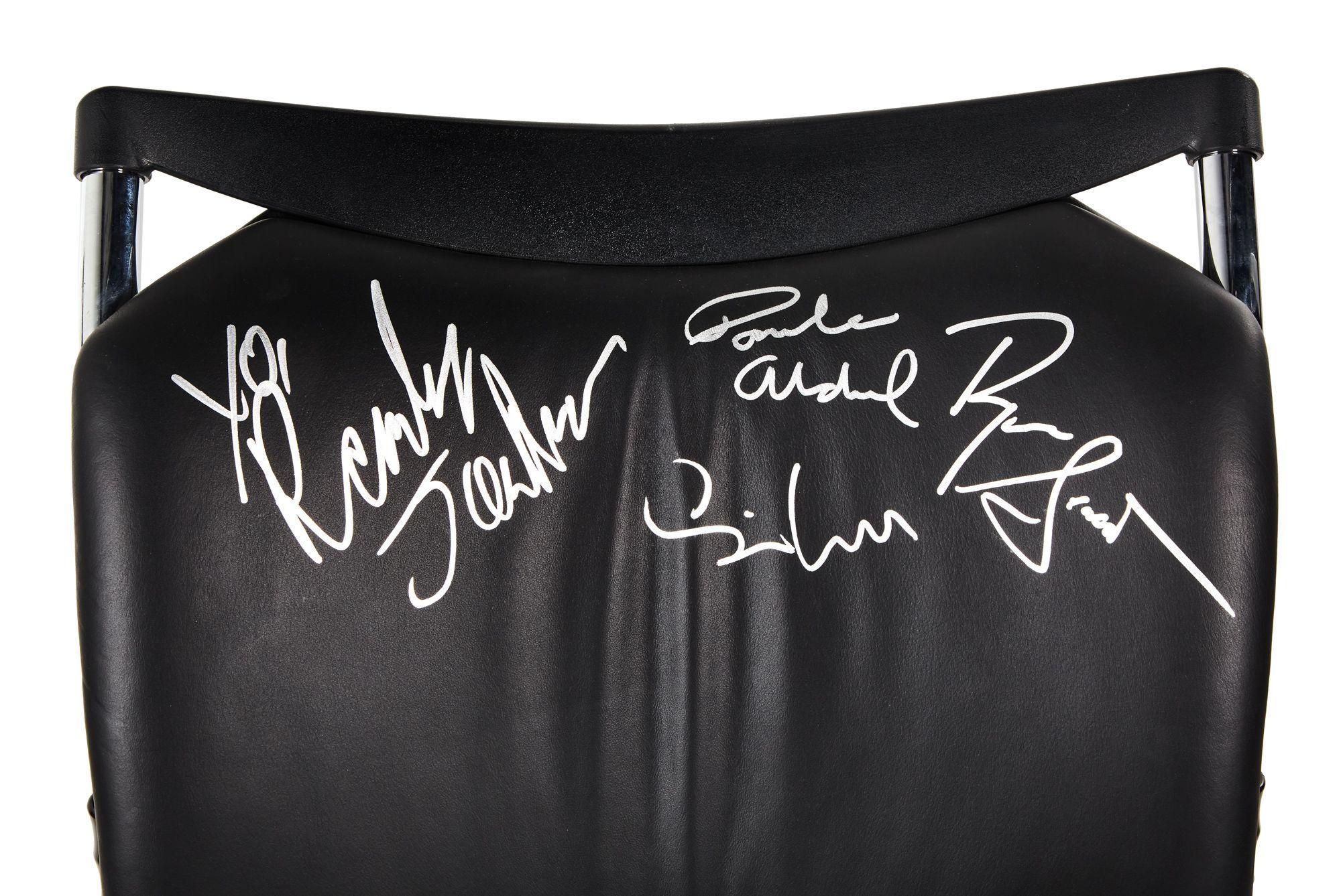 signatures on a leather chair