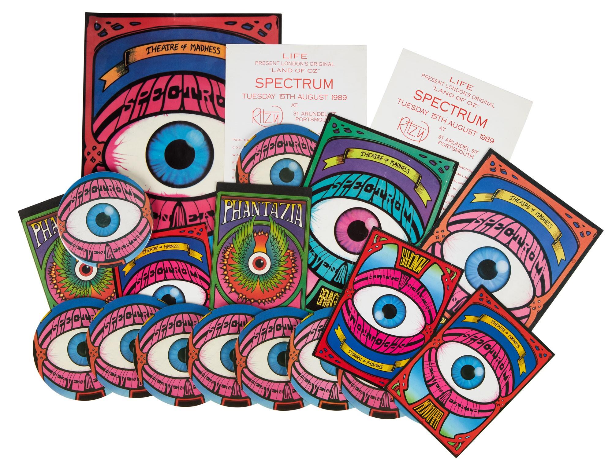 a bunch of cd 's with a rainbow eye on them