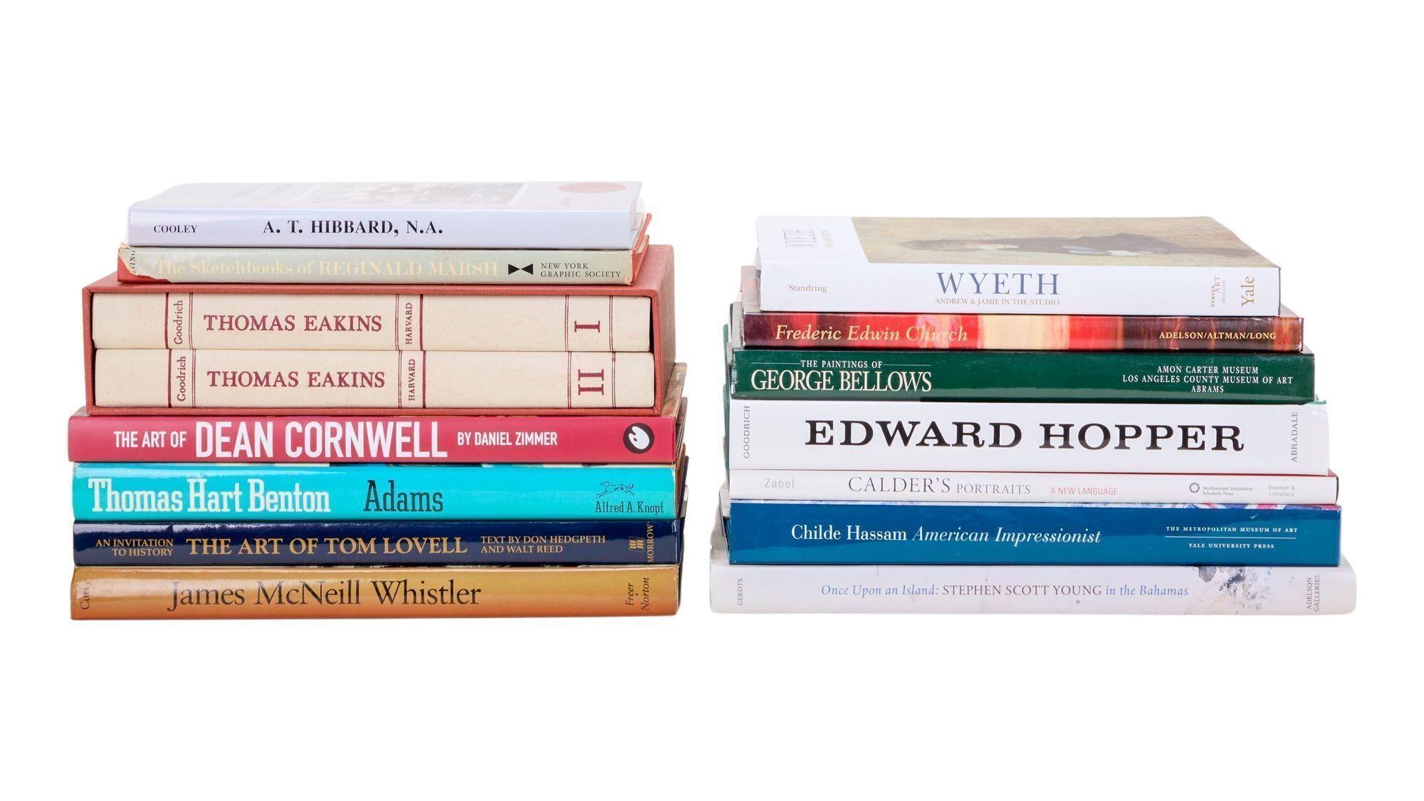 a stack of books sitting next to each other on a table .