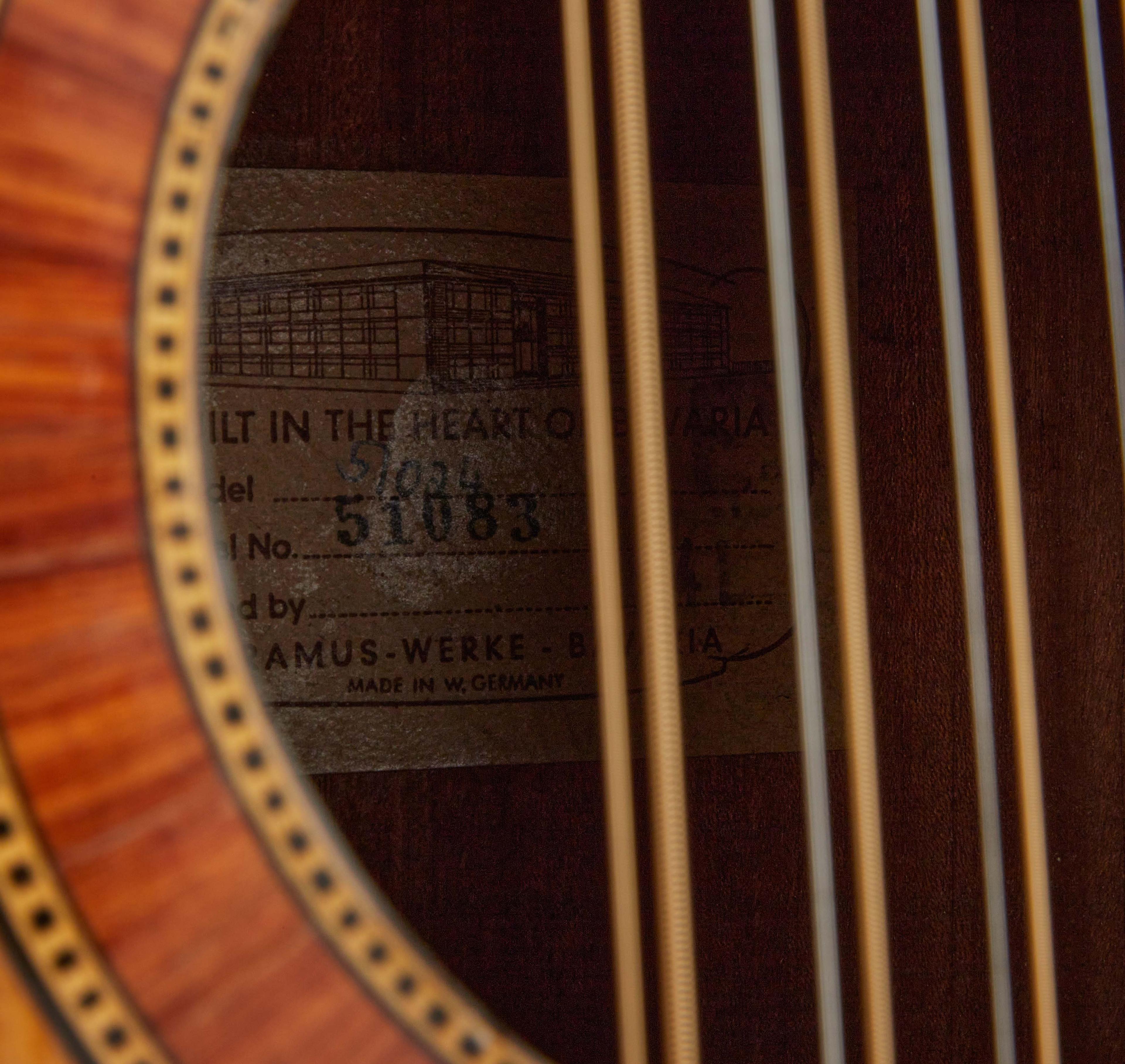a close up of the inside of an acoustic guitar
