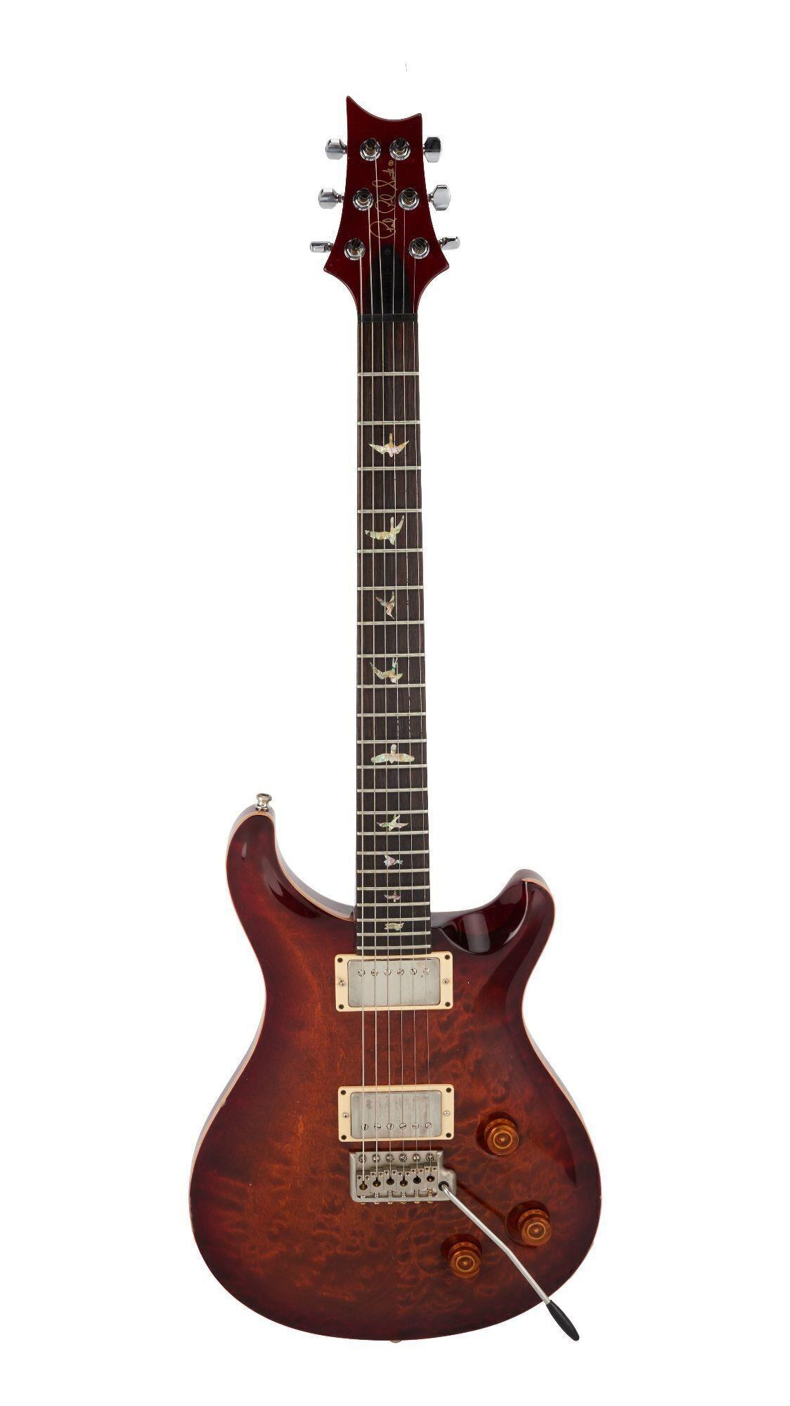 a guitar with the word prs on it