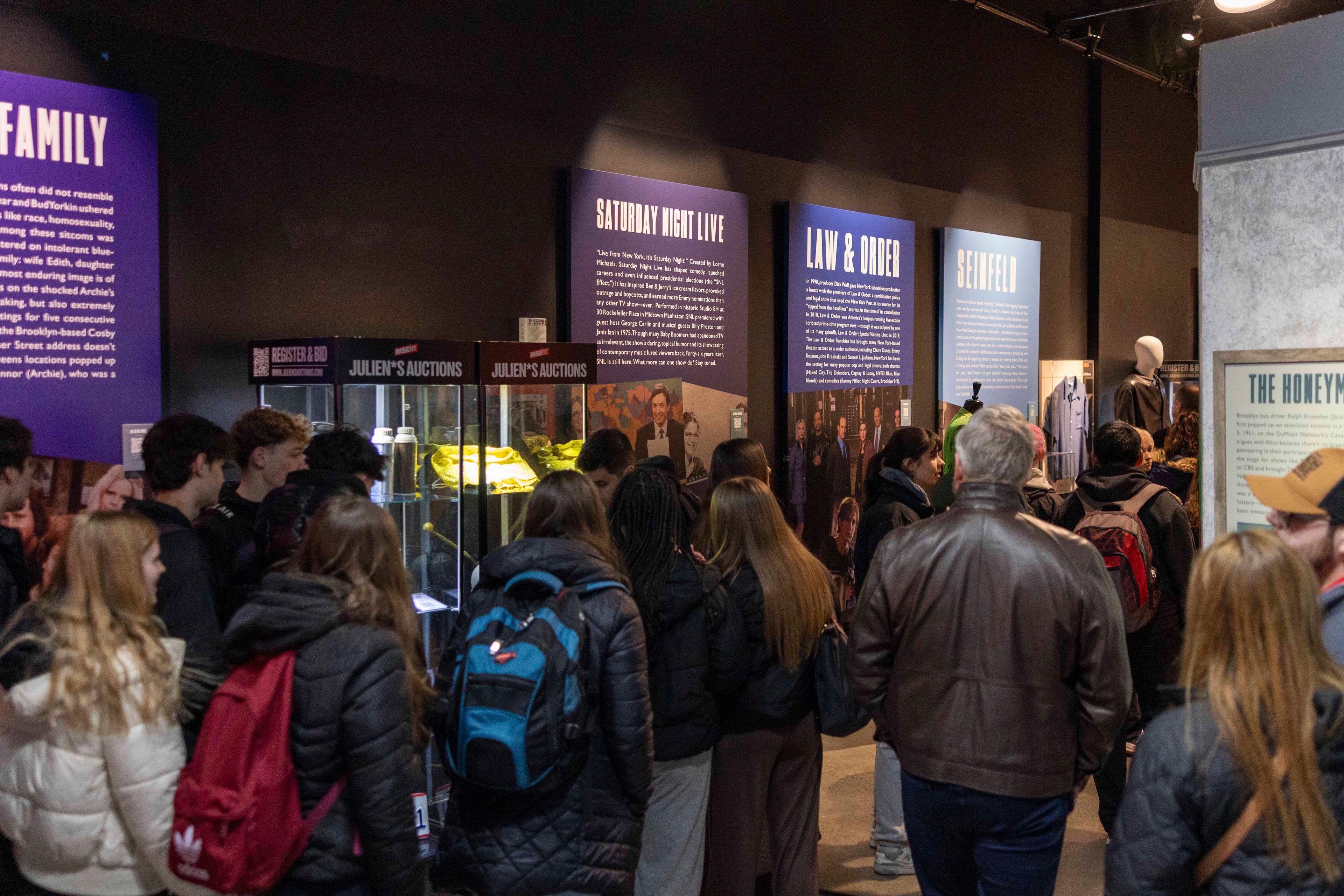 attendees visit a julien's auctions exhibition
