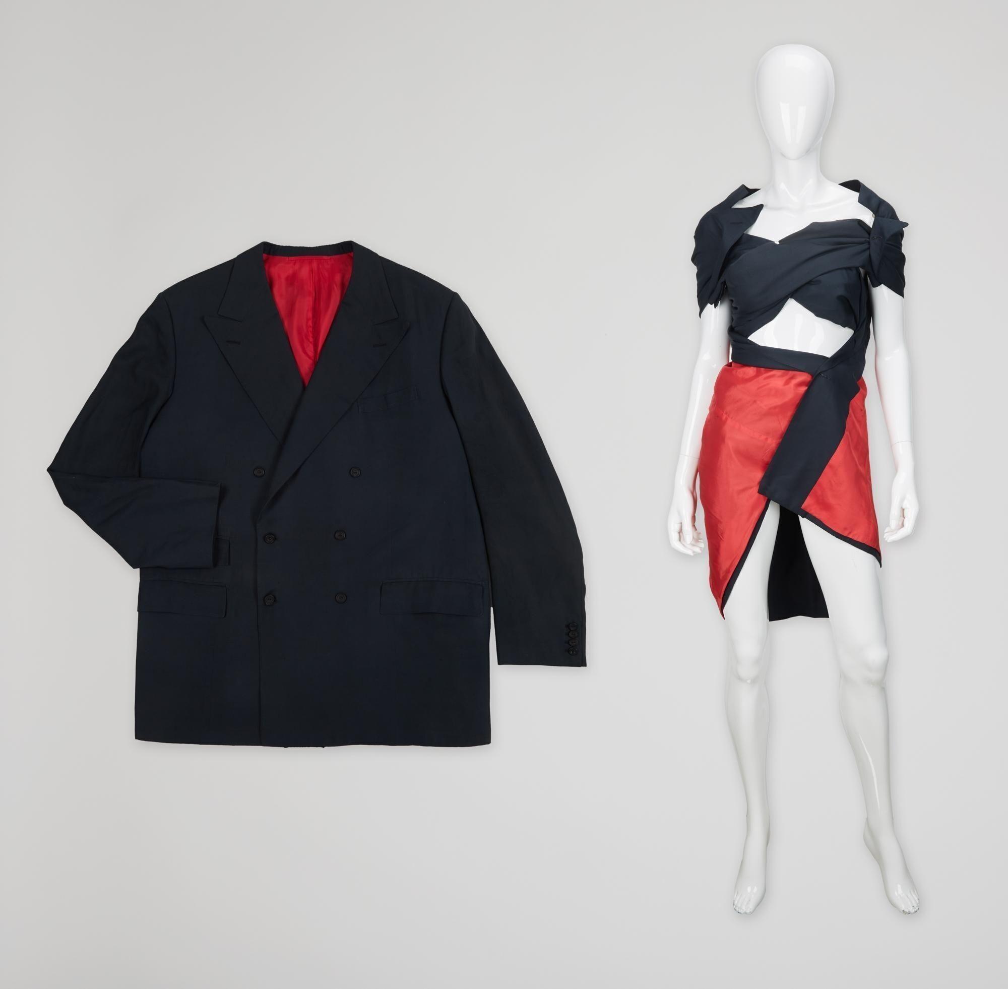 a suit jacket styled on a white mannequin