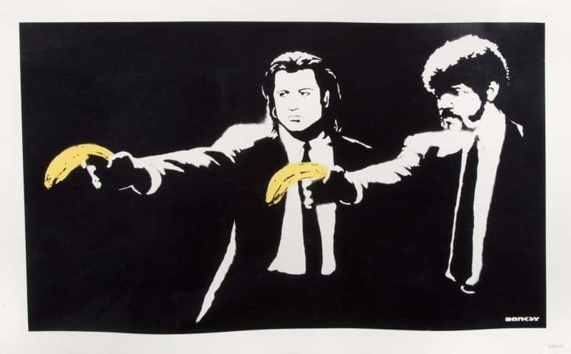 Banksy | Pulp Fiction a banksy artwork depicting john travolta and samuel l jackson holding bananas as guns in the film pulp fiction