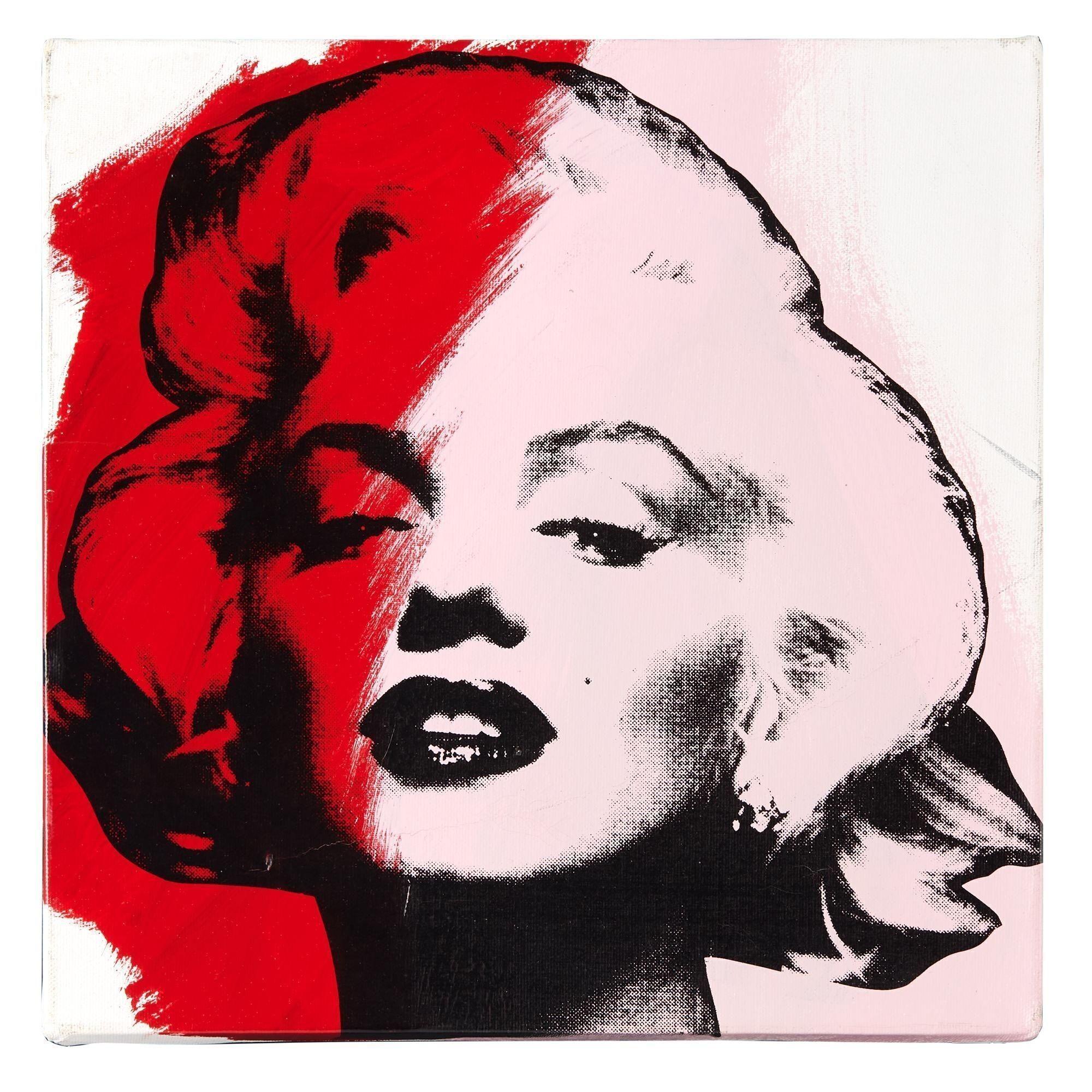 it is a painting of marilyn monroe in red and white .