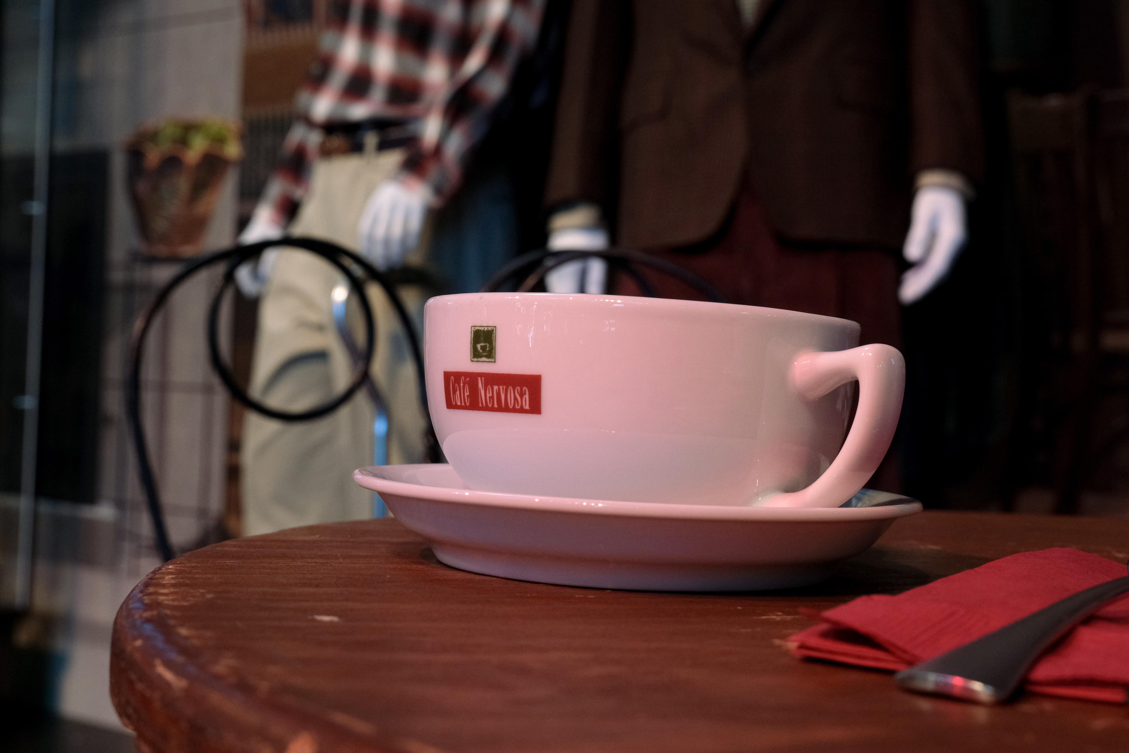 a coffee cup that says safe nervosa