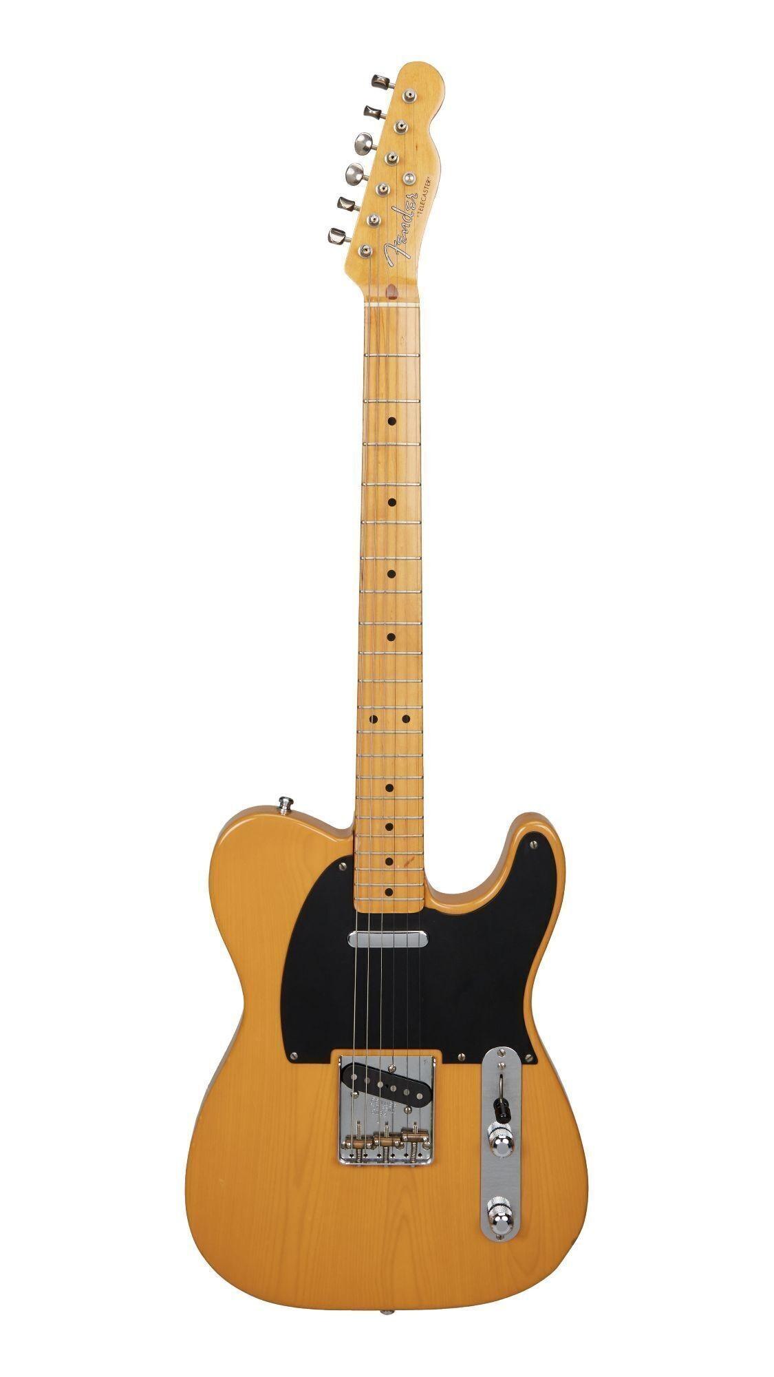 Bob Dylan | Owned and Played 1983 Fender Telecaster, Butterscotch Blonde With Magazine and Photos a fender telecaster guitar with a black pickguard