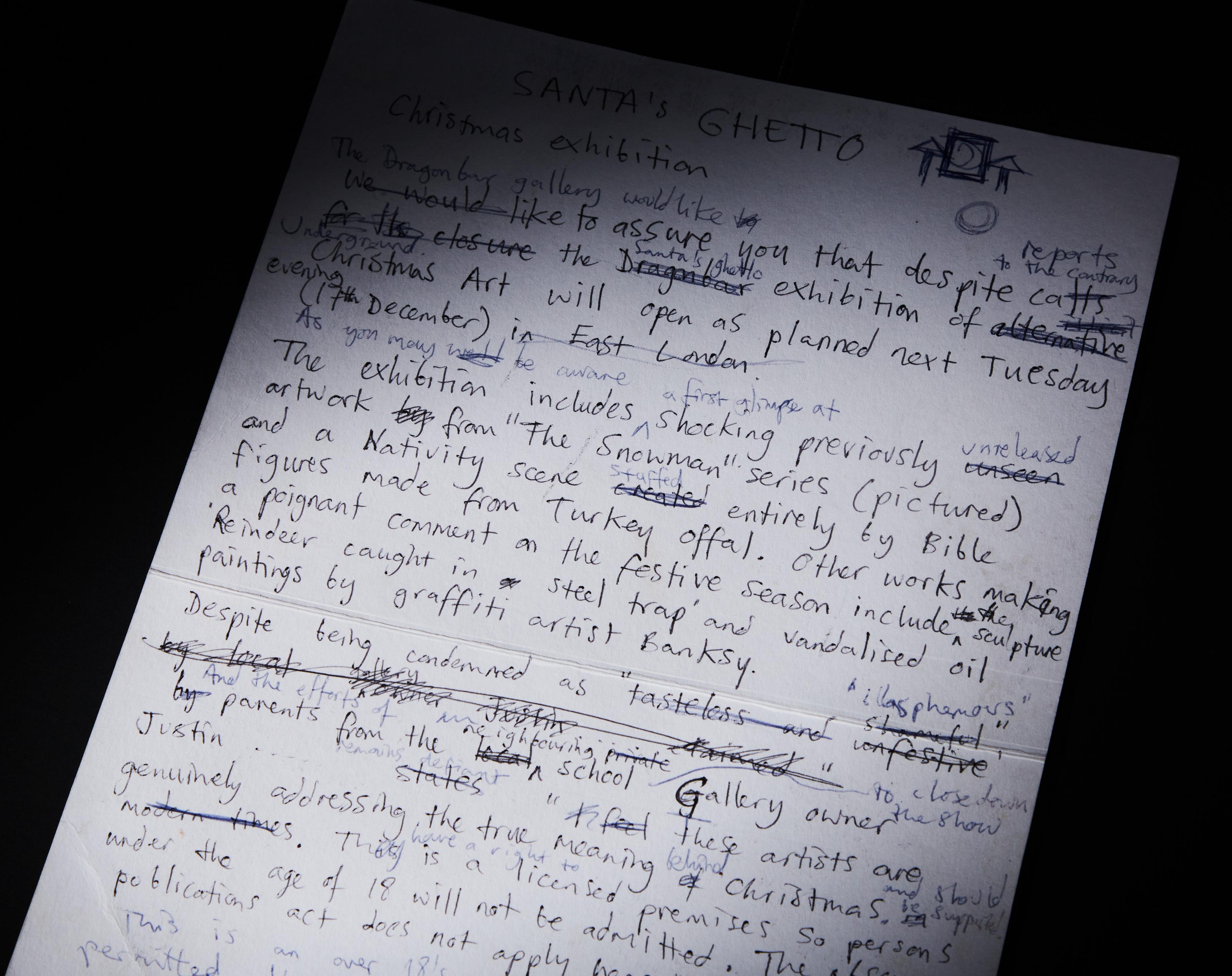 a piece of paper with a lot of writing on it is laying on a table .