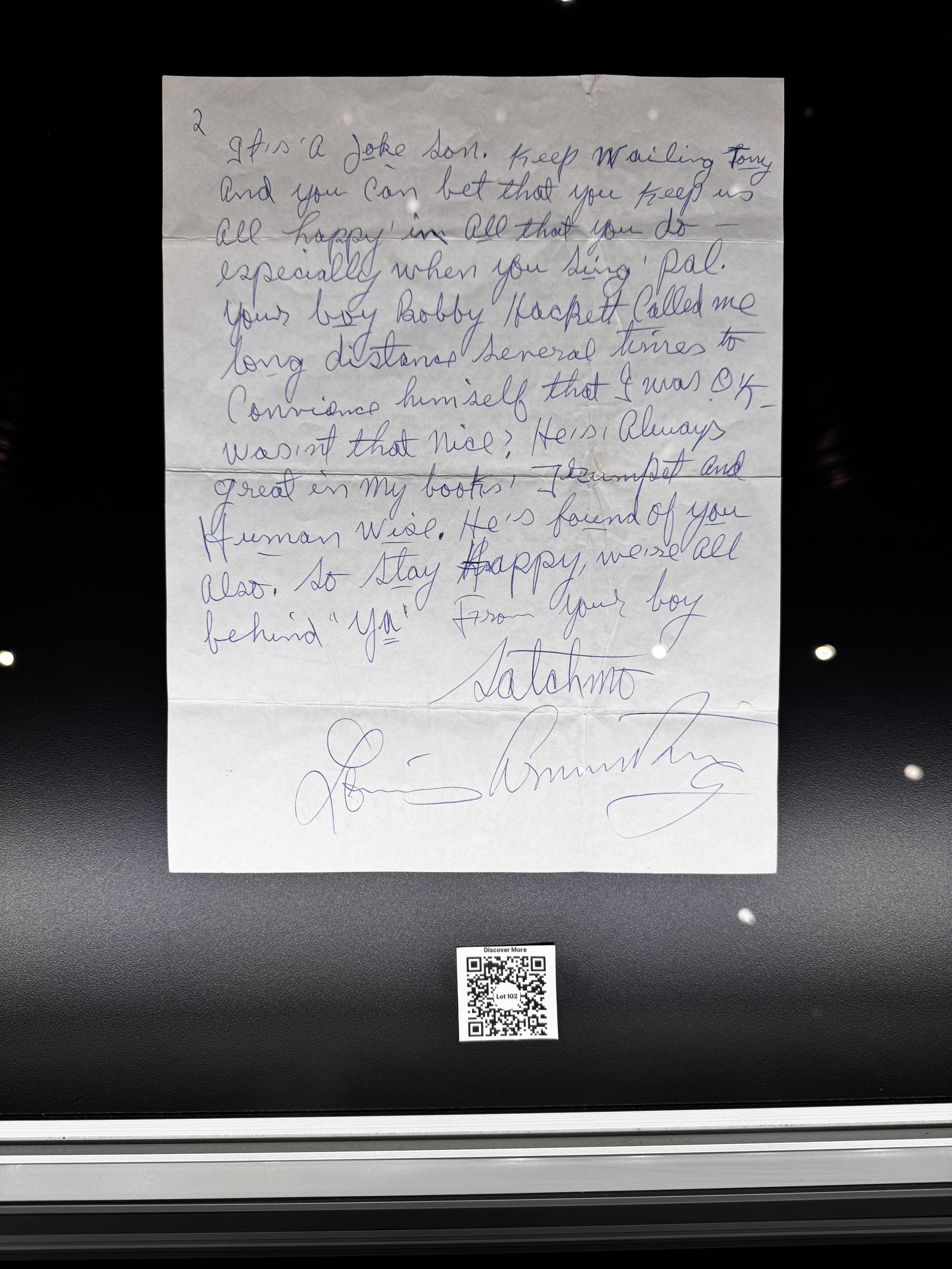 A handwritten letter on a black background