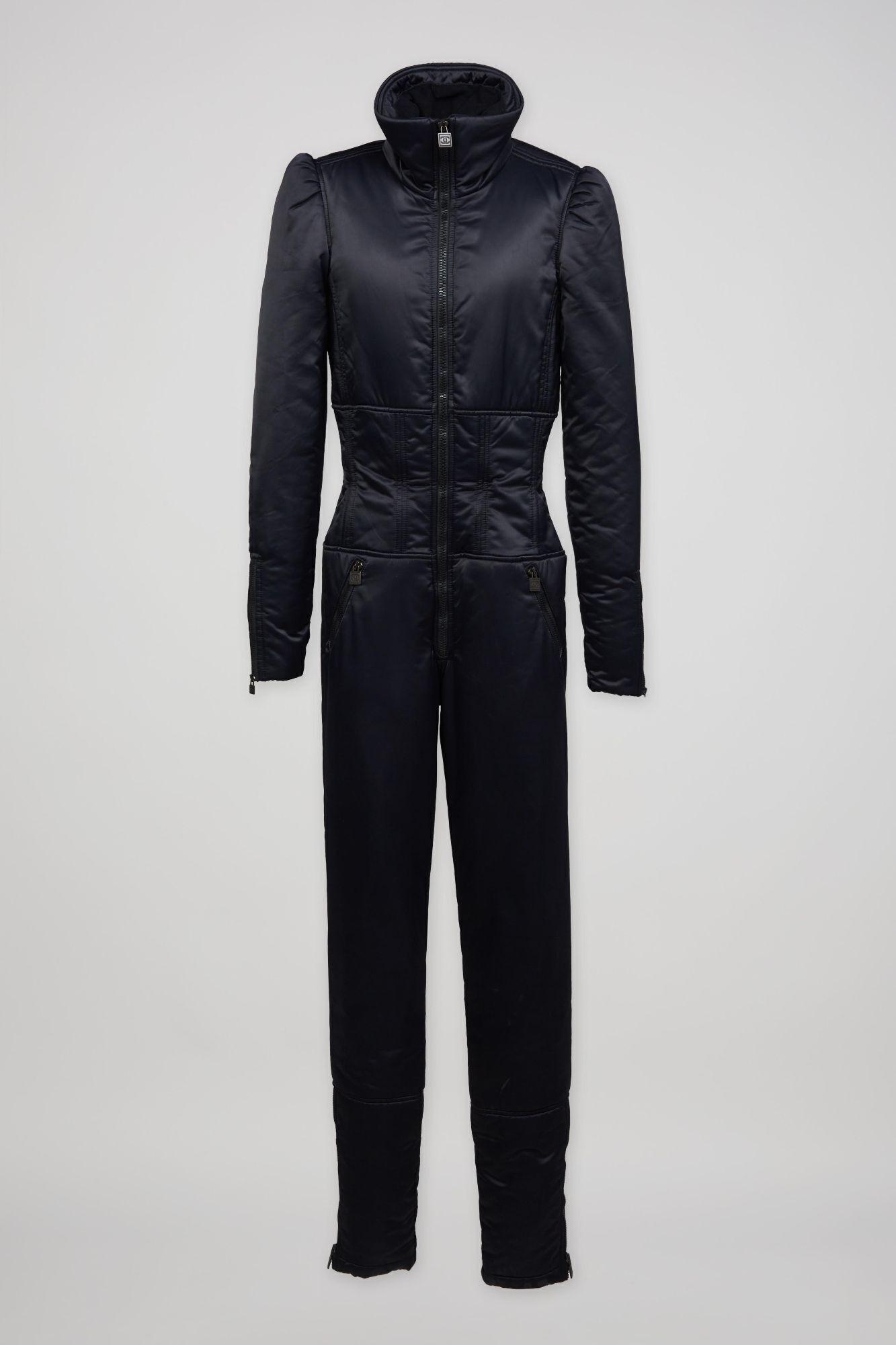 a black jumpsuit with long sleeves and a collar